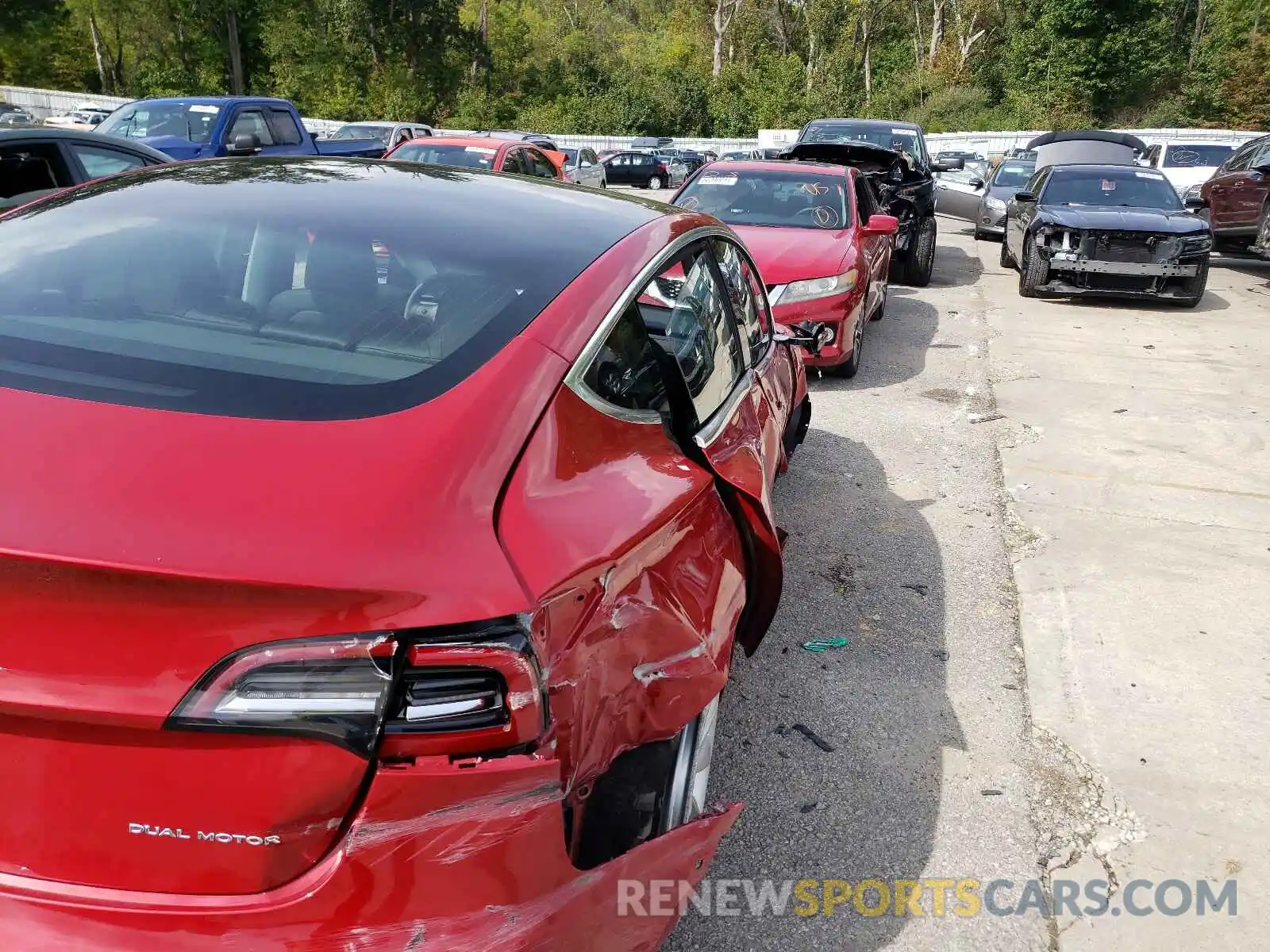 4 Photograph of a damaged car 5YJ3E1EB1LF465097 TESLA MODEL 3 2020