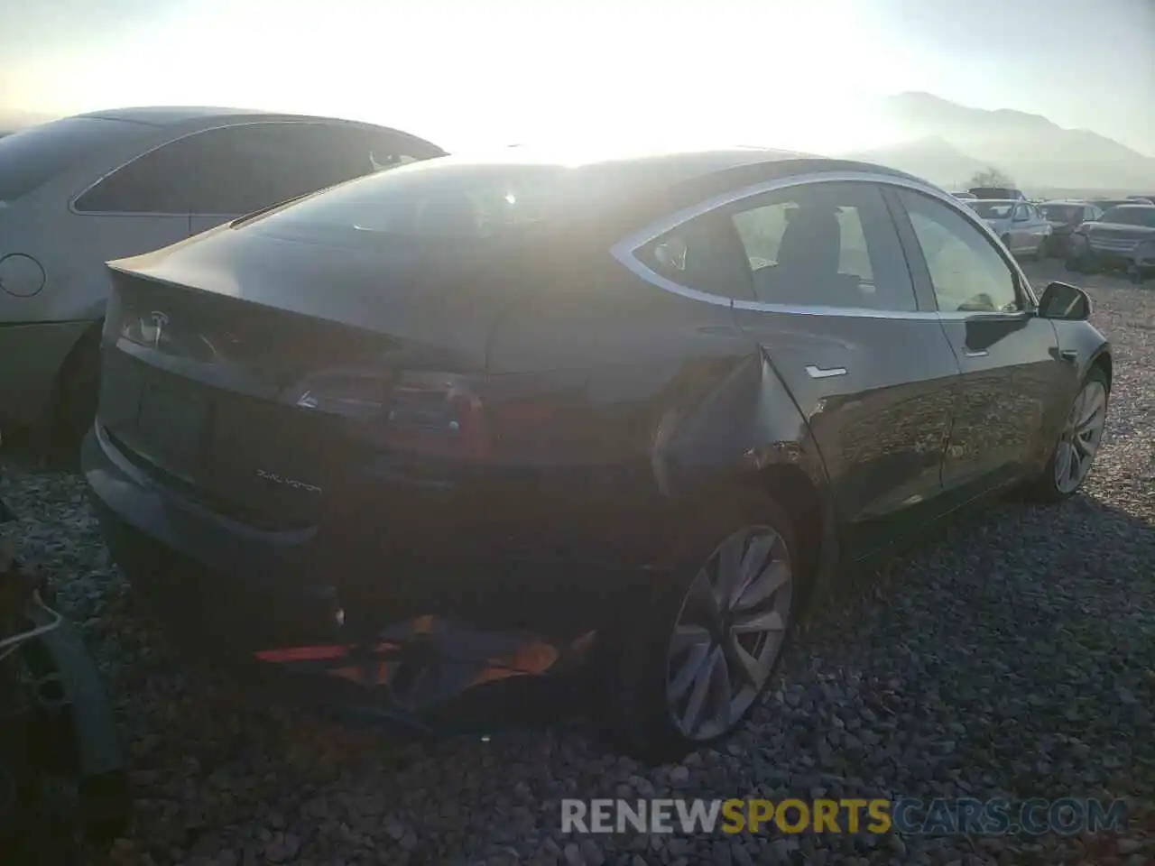 4 Photograph of a damaged car 5YJ3E1EB1LF600692 TESLA MODEL 3 2020