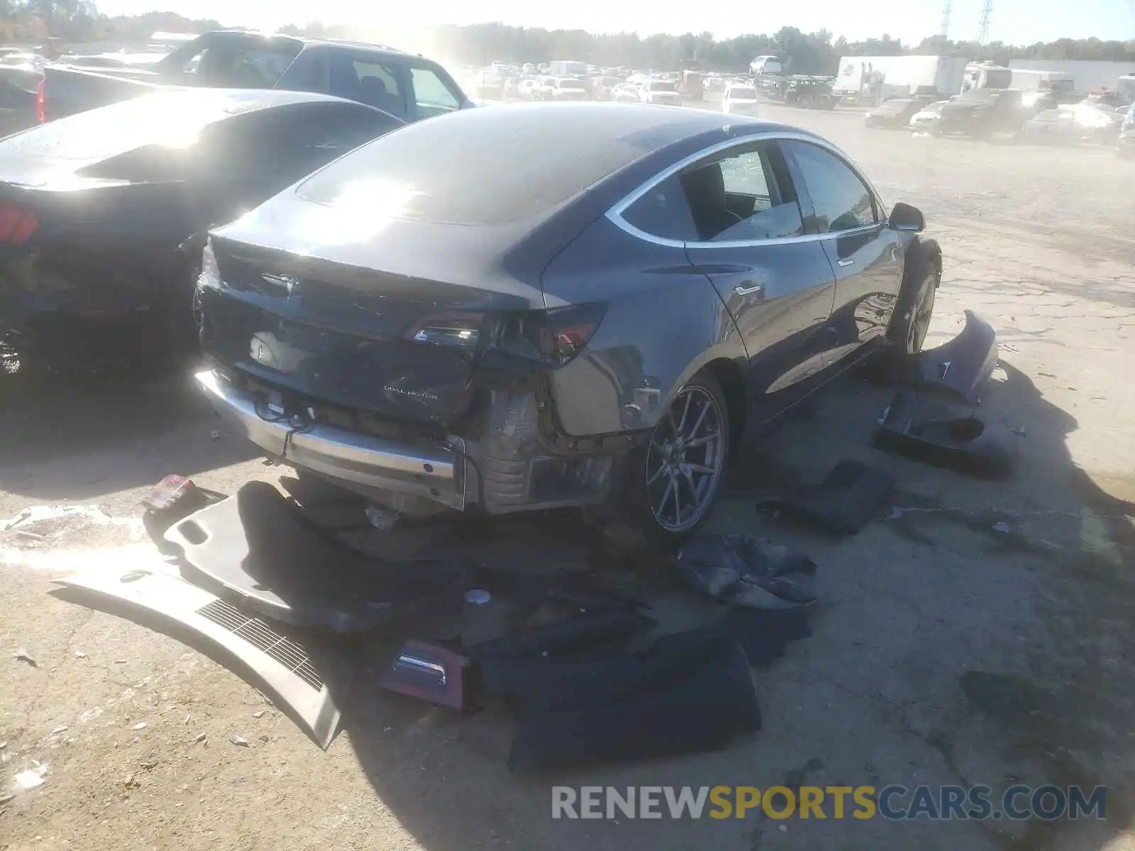 4 Photograph of a damaged car 5YJ3E1EB1LF616617 TESLA MODEL 3 2020