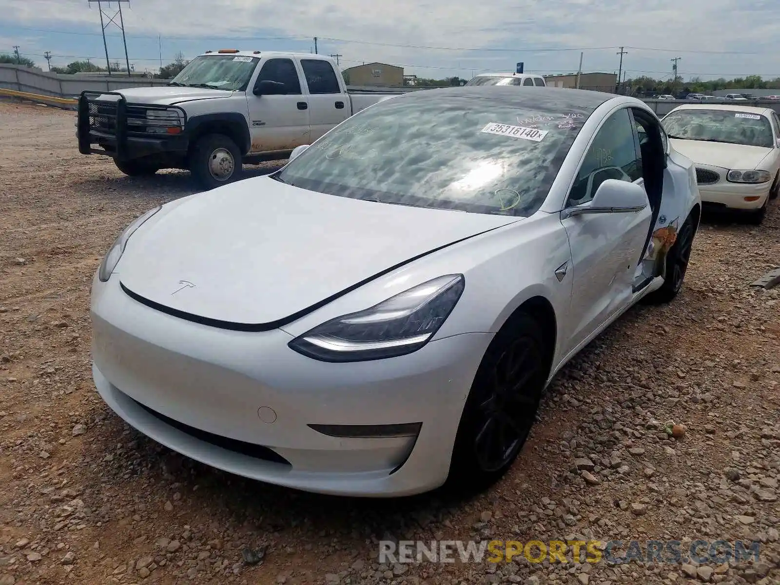 2 Photograph of a damaged car 5YJ3E1EB1LF618559 TESLA MODEL 3 2020