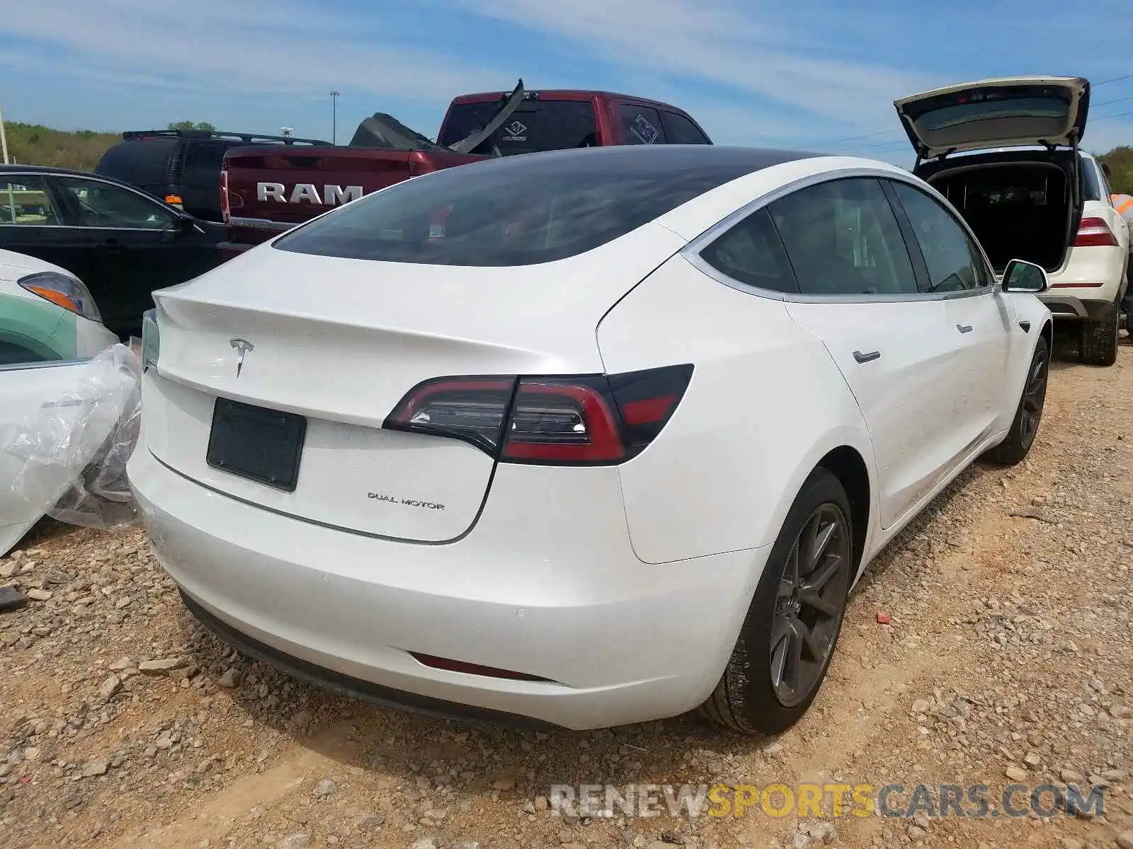 4 Photograph of a damaged car 5YJ3E1EB1LF618559 TESLA MODEL 3 2020