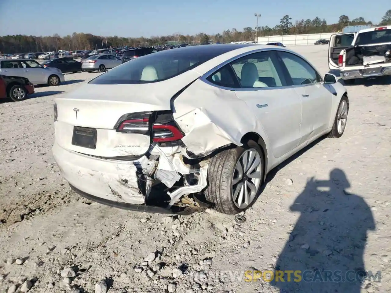 4 Photograph of a damaged car 5YJ3E1EB1LF622966 TESLA MODEL 3 2020