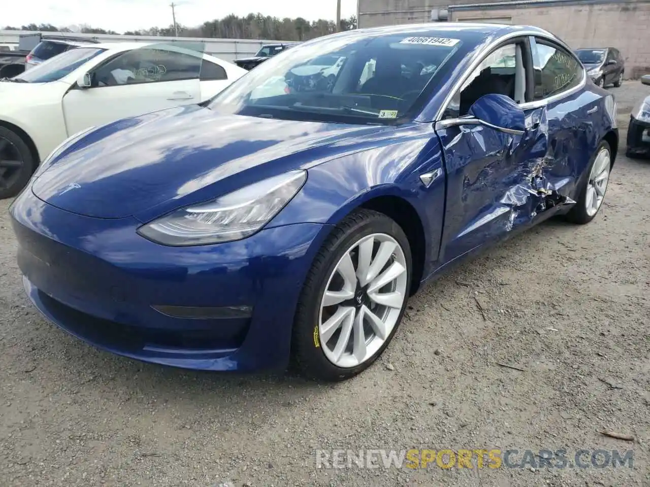 2 Photograph of a damaged car 5YJ3E1EB1LF638357 TESLA MODEL 3 2020