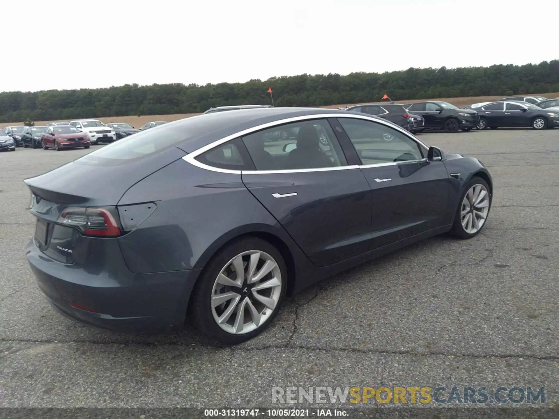 4 Photograph of a damaged car 5YJ3E1EB1LF647916 TESLA MODEL 3 2020