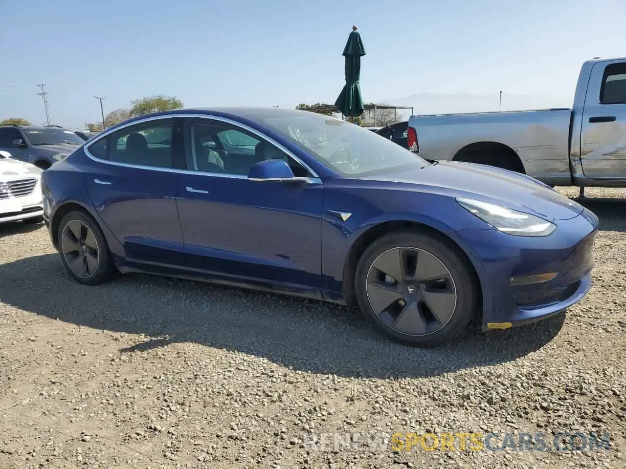 4 Photograph of a damaged car 5YJ3E1EB1LF650007 TESLA MODEL 3 2020