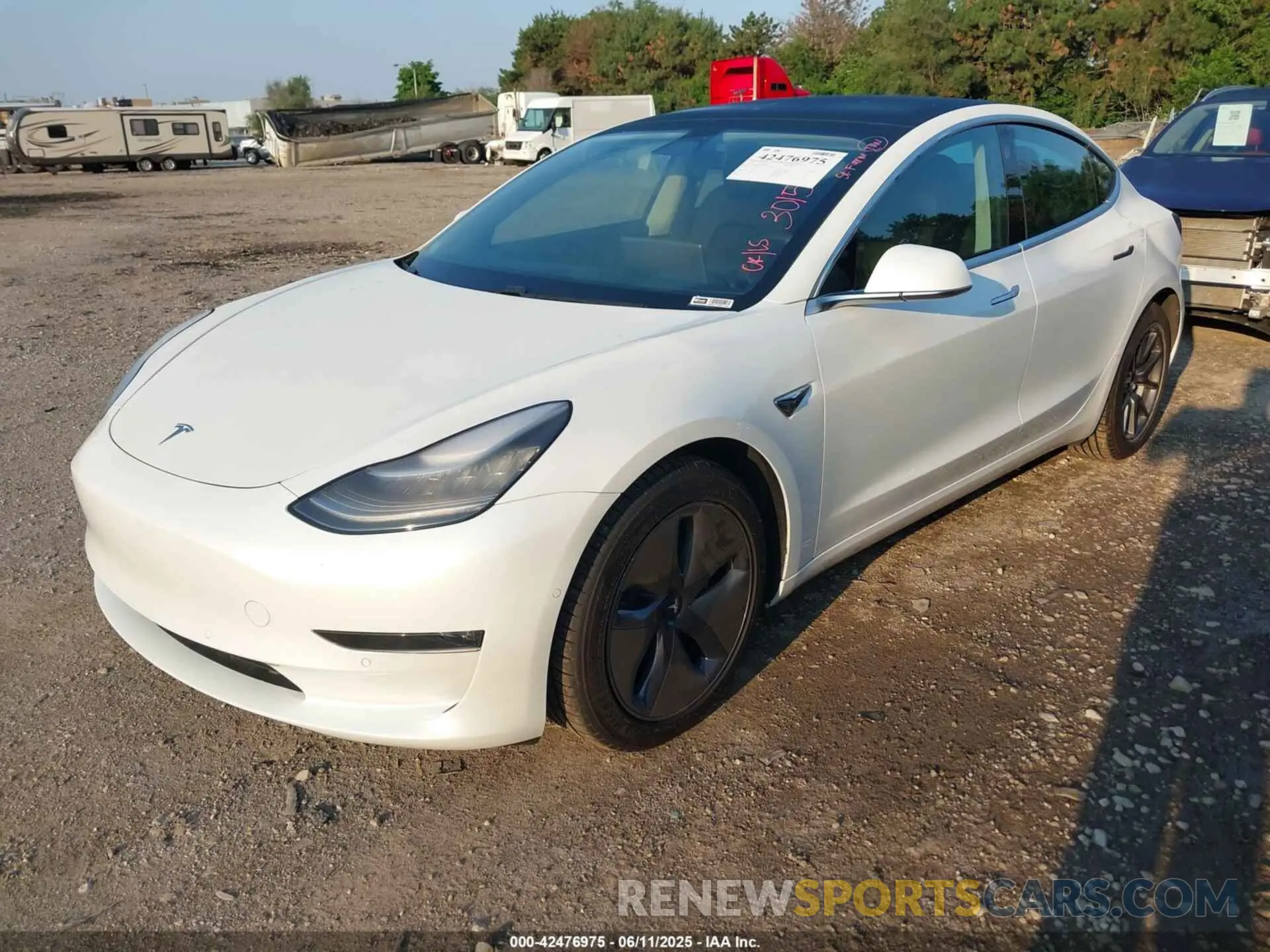 2 Photograph of a damaged car 5YJ3E1EB1LF665106 TESLA MODEL 3 2020