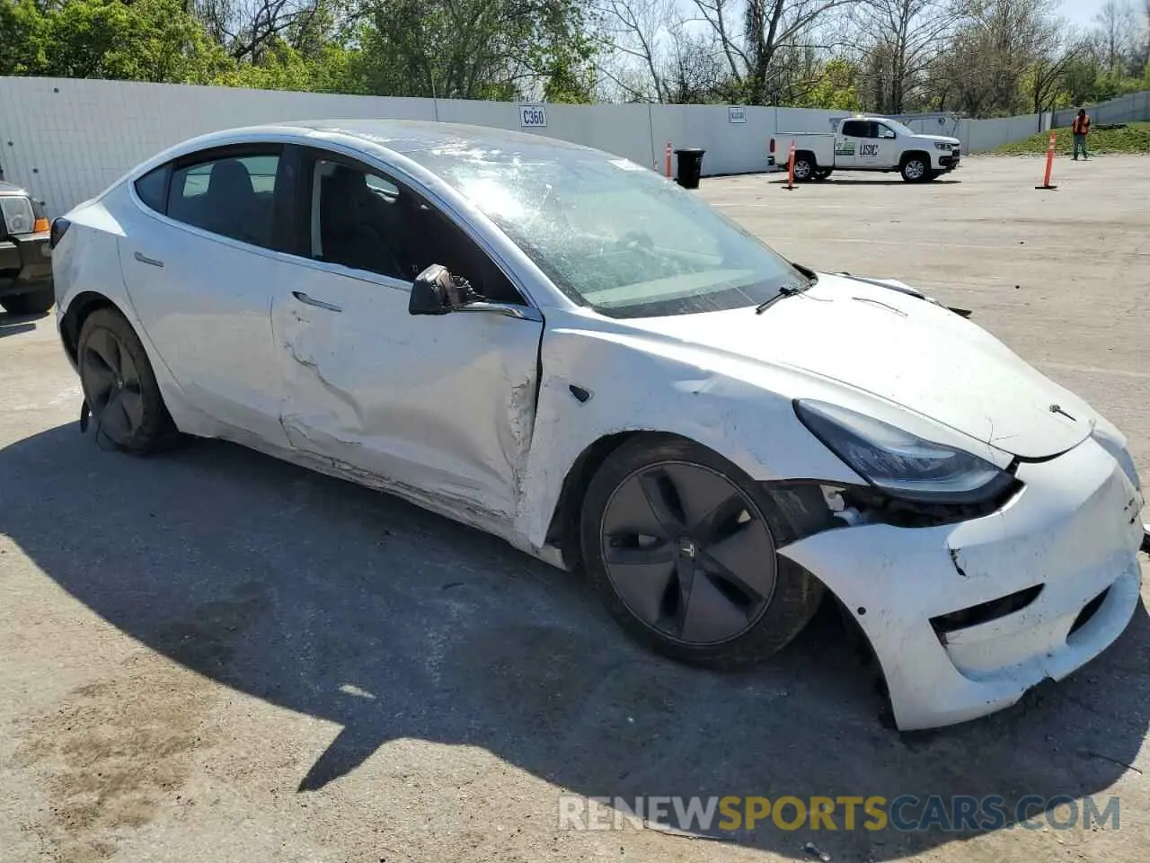 4 Photograph of a damaged car 5YJ3E1EB1LF665543 TESLA MODEL 3 2020