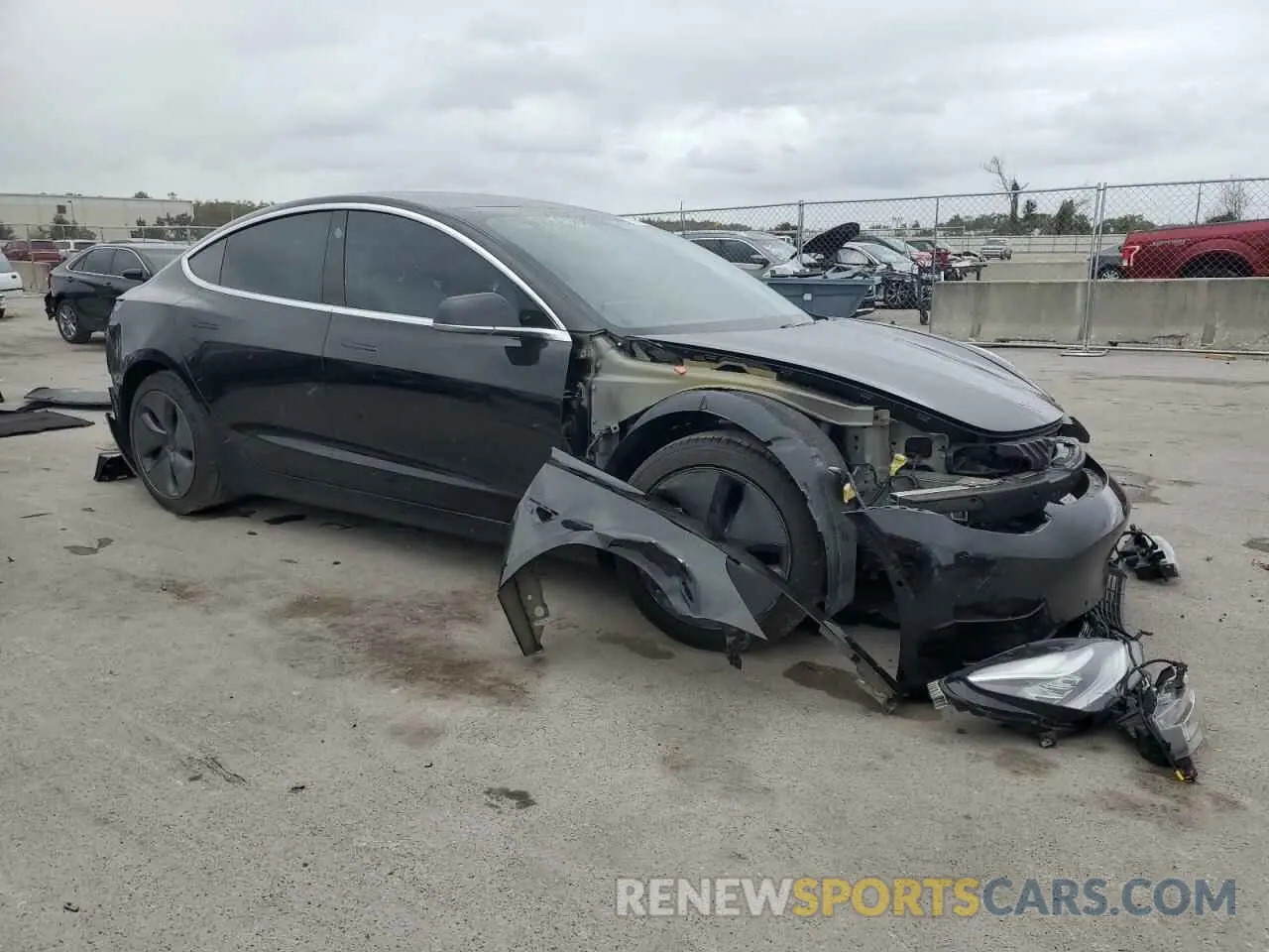 4 Photograph of a damaged car 5YJ3E1EB1LF735770 TESLA MODEL 3 2020