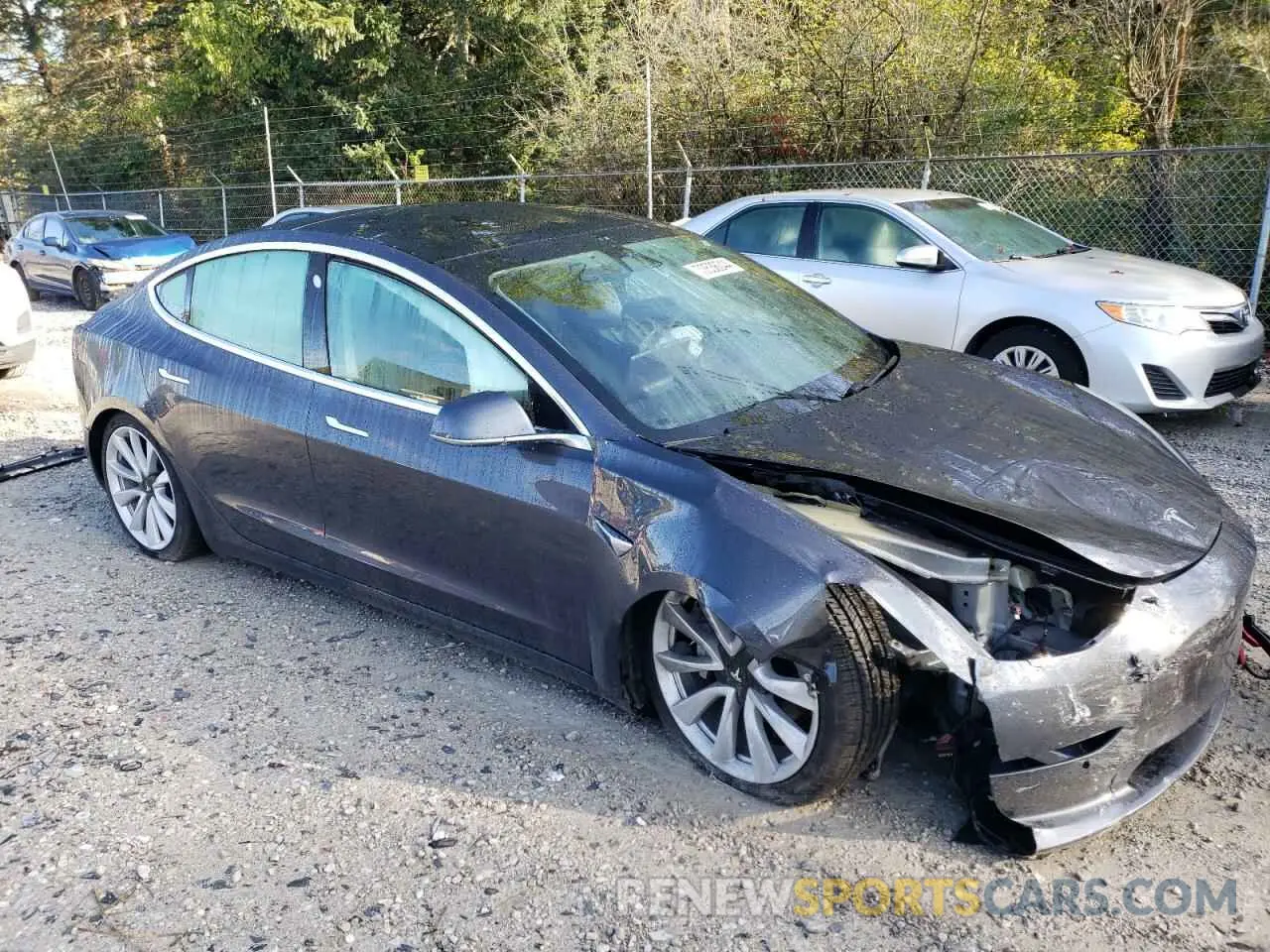 4 Photograph of a damaged car 5YJ3E1EB1LF790929 TESLA MODEL 3 2020