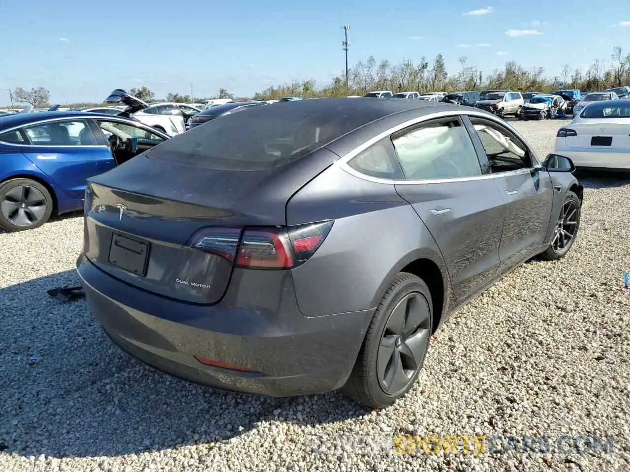 4 Photograph of a damaged car 5YJ3E1EB1LF793572 TESLA MODEL 3 2020