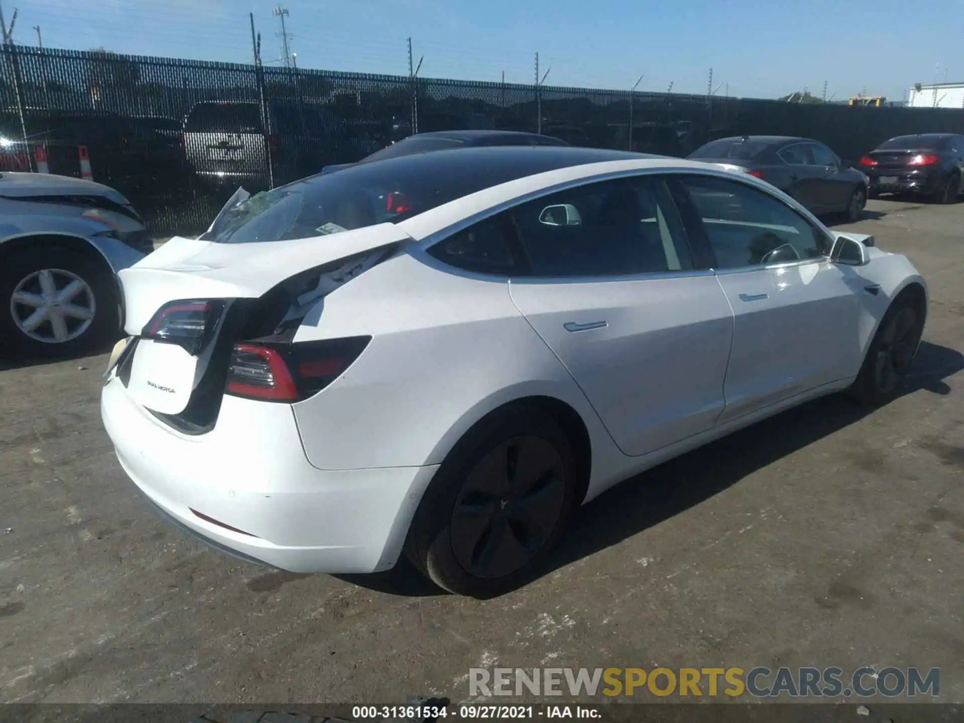 4 Photograph of a damaged car 5YJ3E1EB1LF795130 TESLA MODEL 3 2020