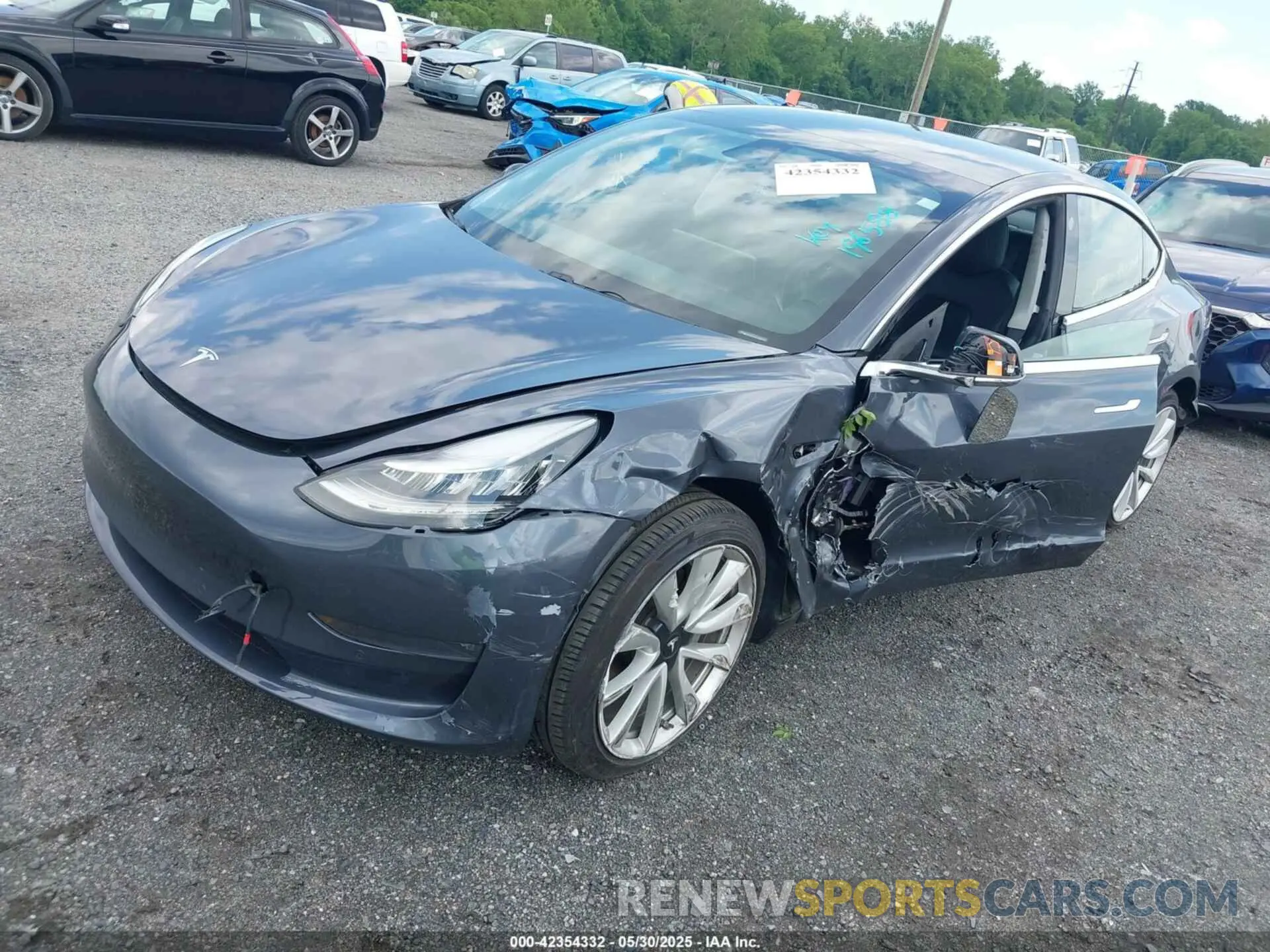 2 Photograph of a damaged car 5YJ3E1EB2LF588925 TESLA MODEL 3 2020