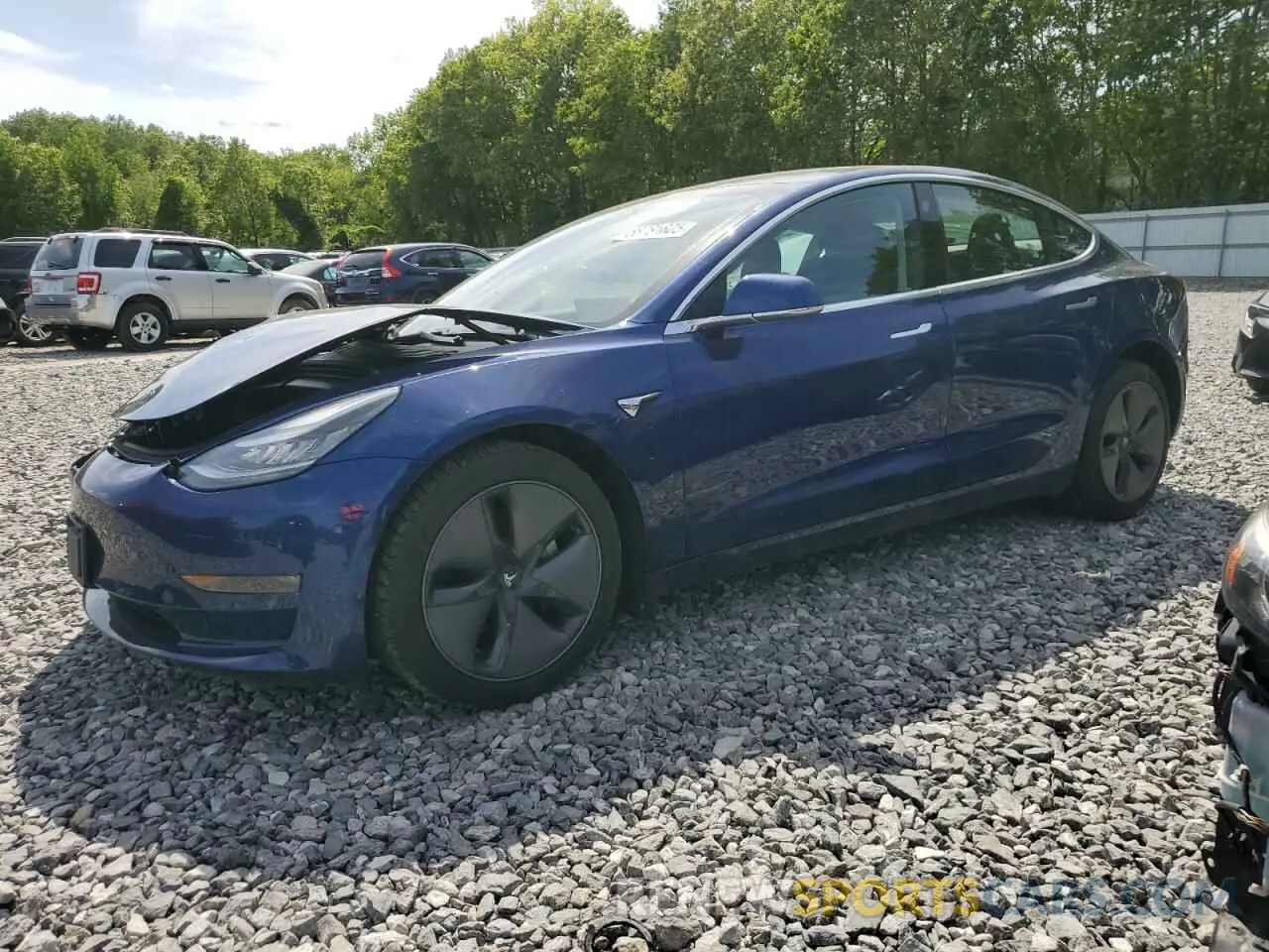 1 Photograph of a damaged car 5YJ3E1EB2LF617579 TESLA MODEL 3 2020