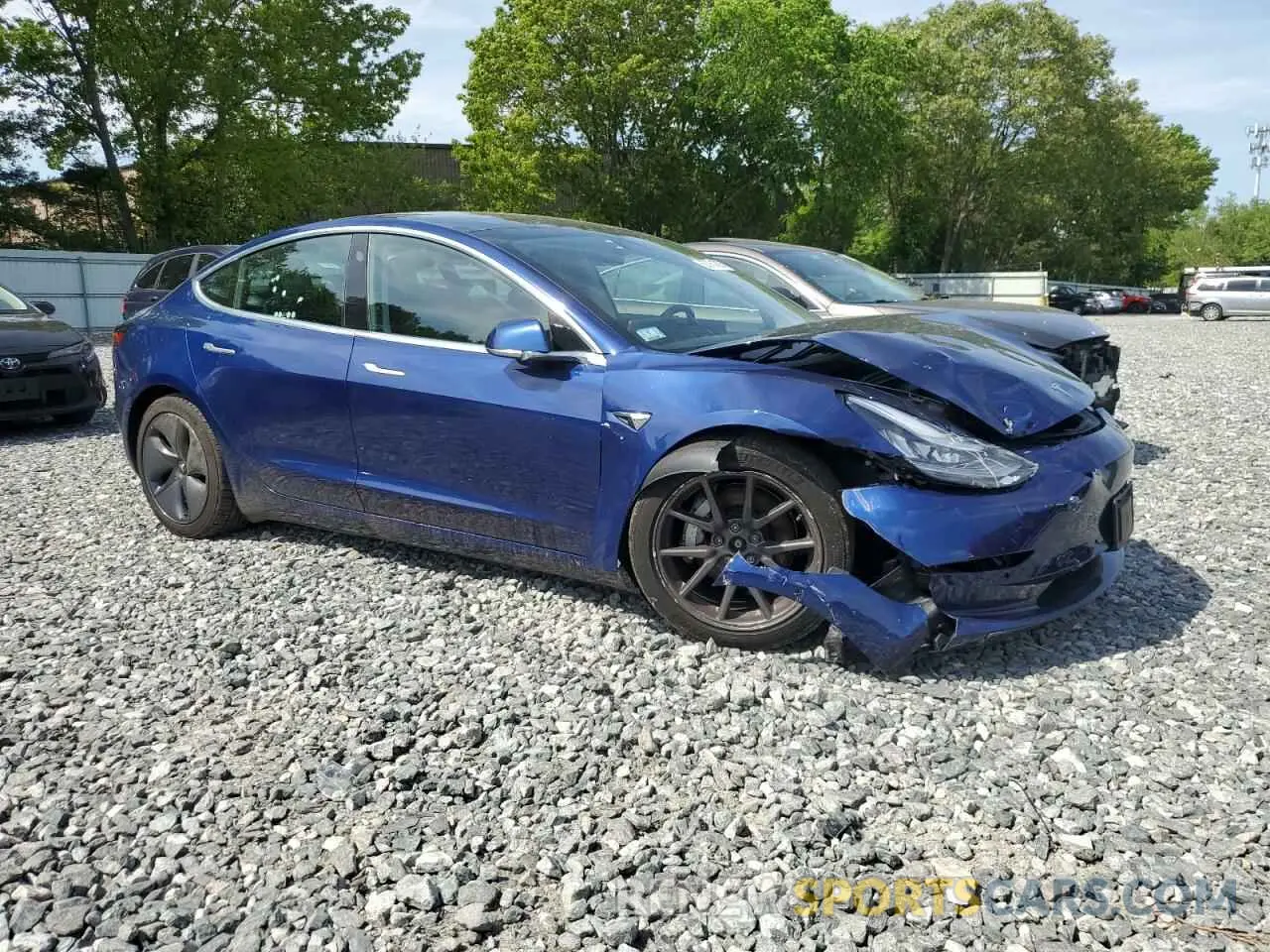 4 Photograph of a damaged car 5YJ3E1EB2LF617579 TESLA MODEL 3 2020