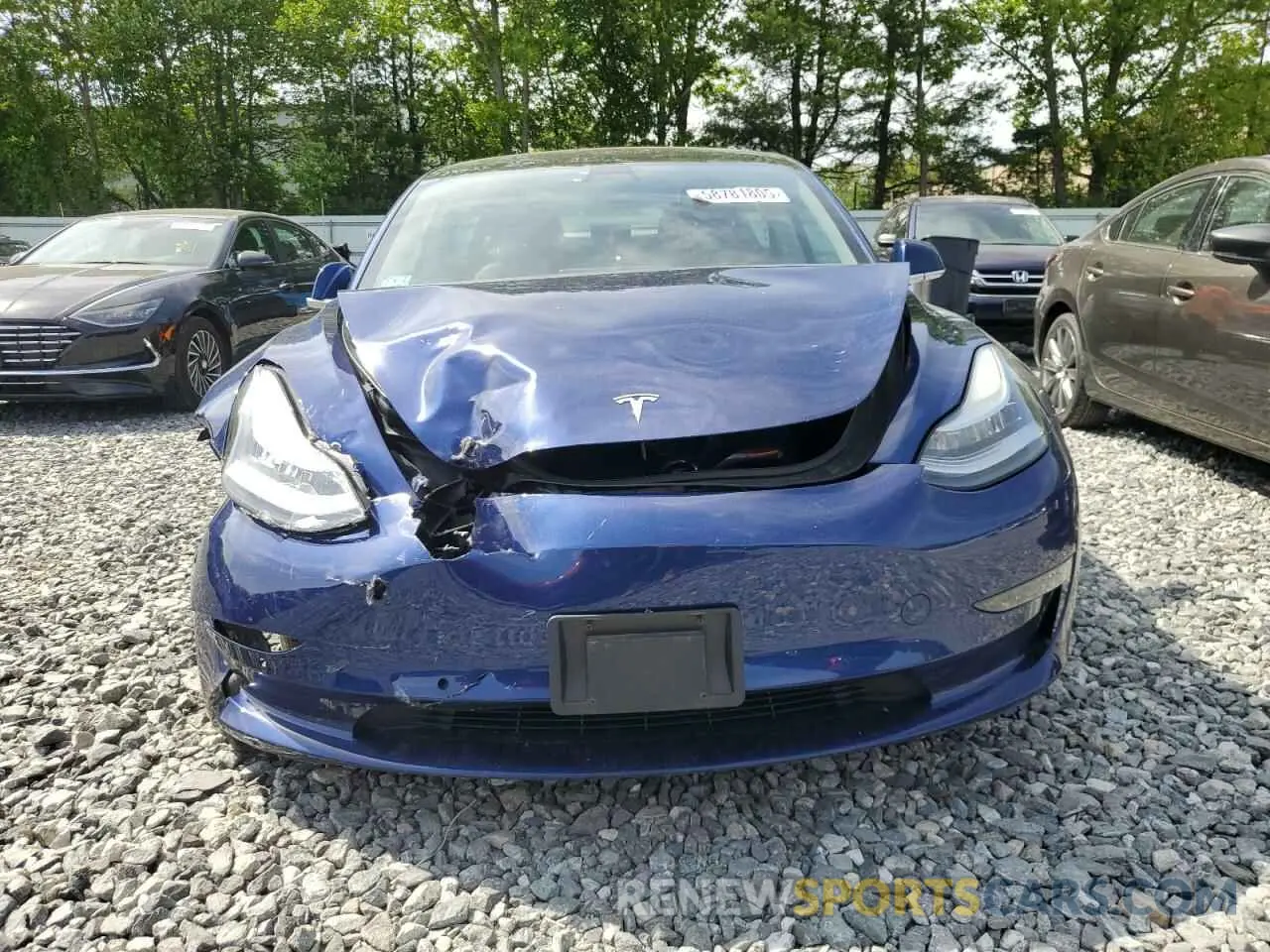 5 Photograph of a damaged car 5YJ3E1EB2LF617579 TESLA MODEL 3 2020