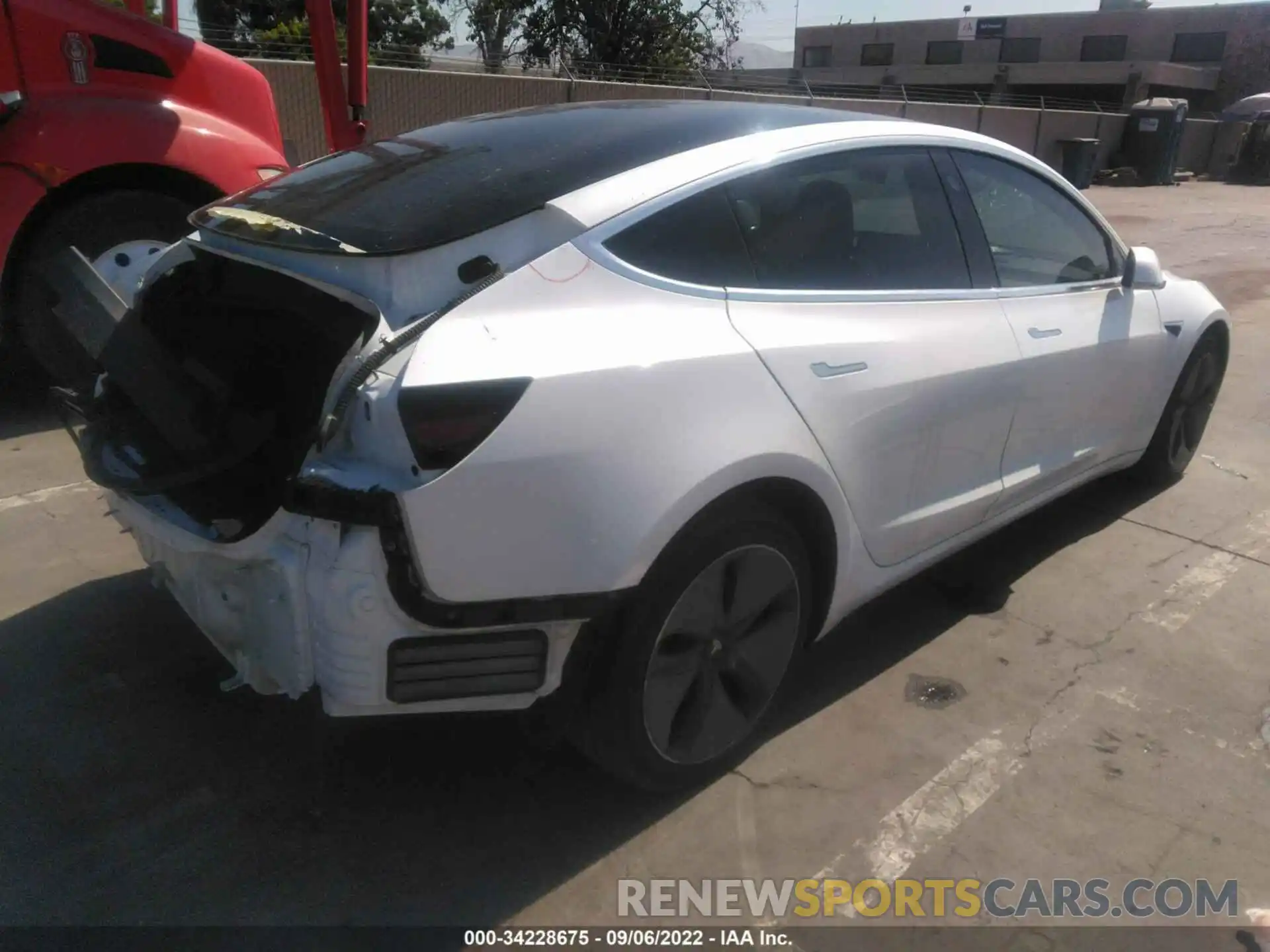 4 Photograph of a damaged car 5YJ3E1EB2LF619624 TESLA MODEL 3 2020