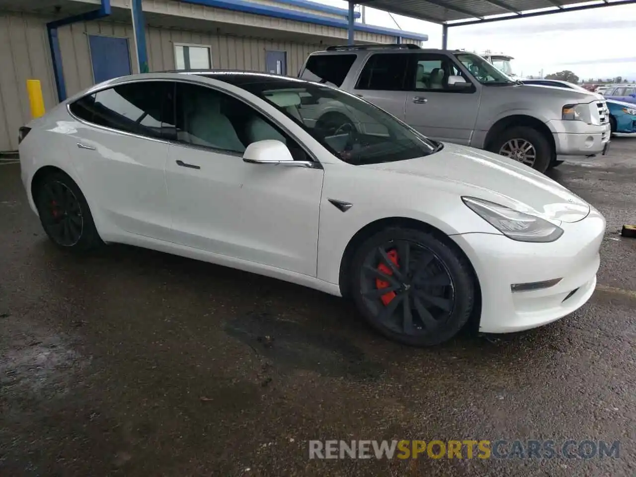 4 Photograph of a damaged car 5YJ3E1EB2LF622863 TESLA MODEL 3 2020