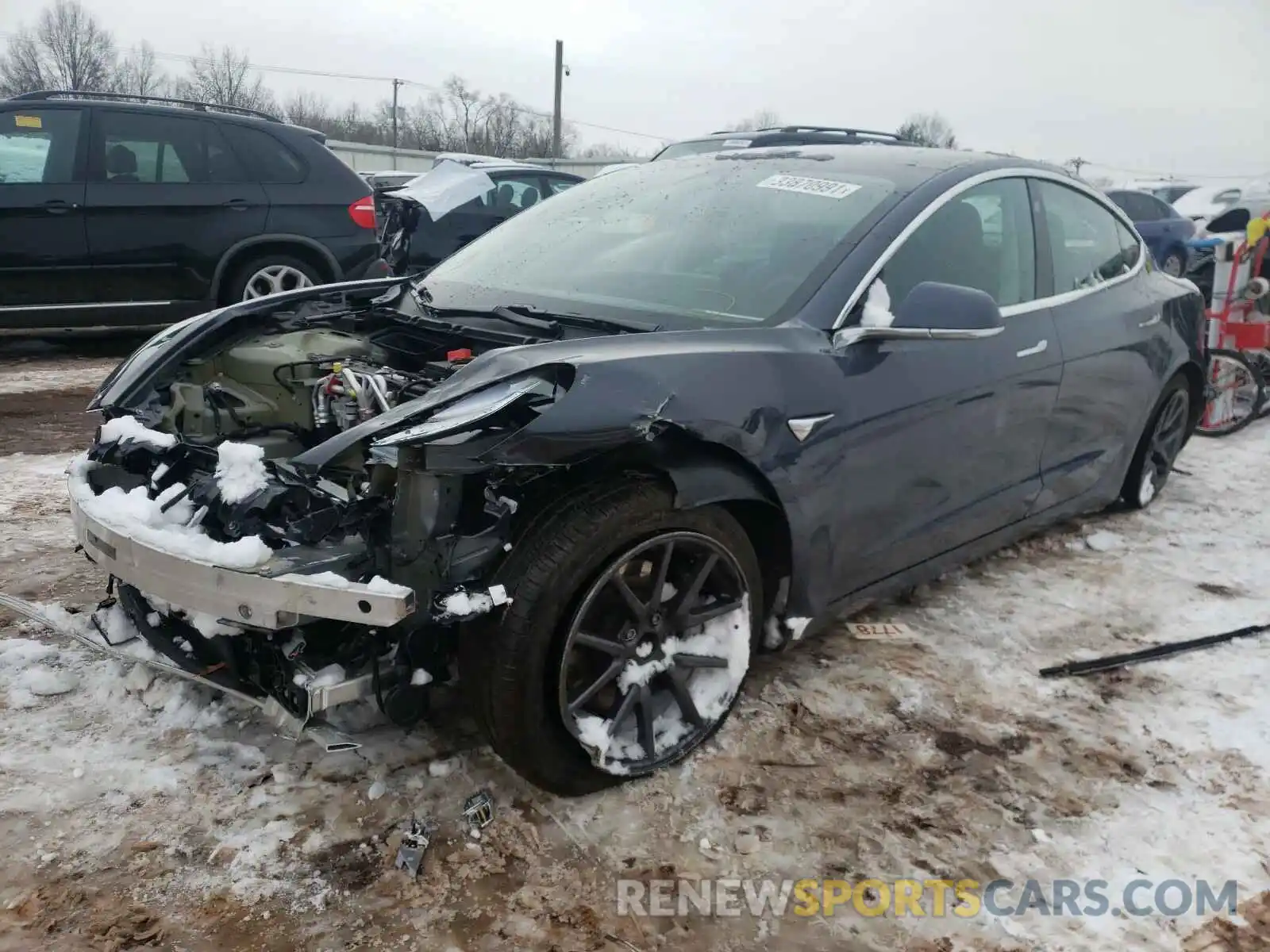 2 Photograph of a damaged car 5YJ3E1EB2LF635287 TESLA MODEL 3 2020