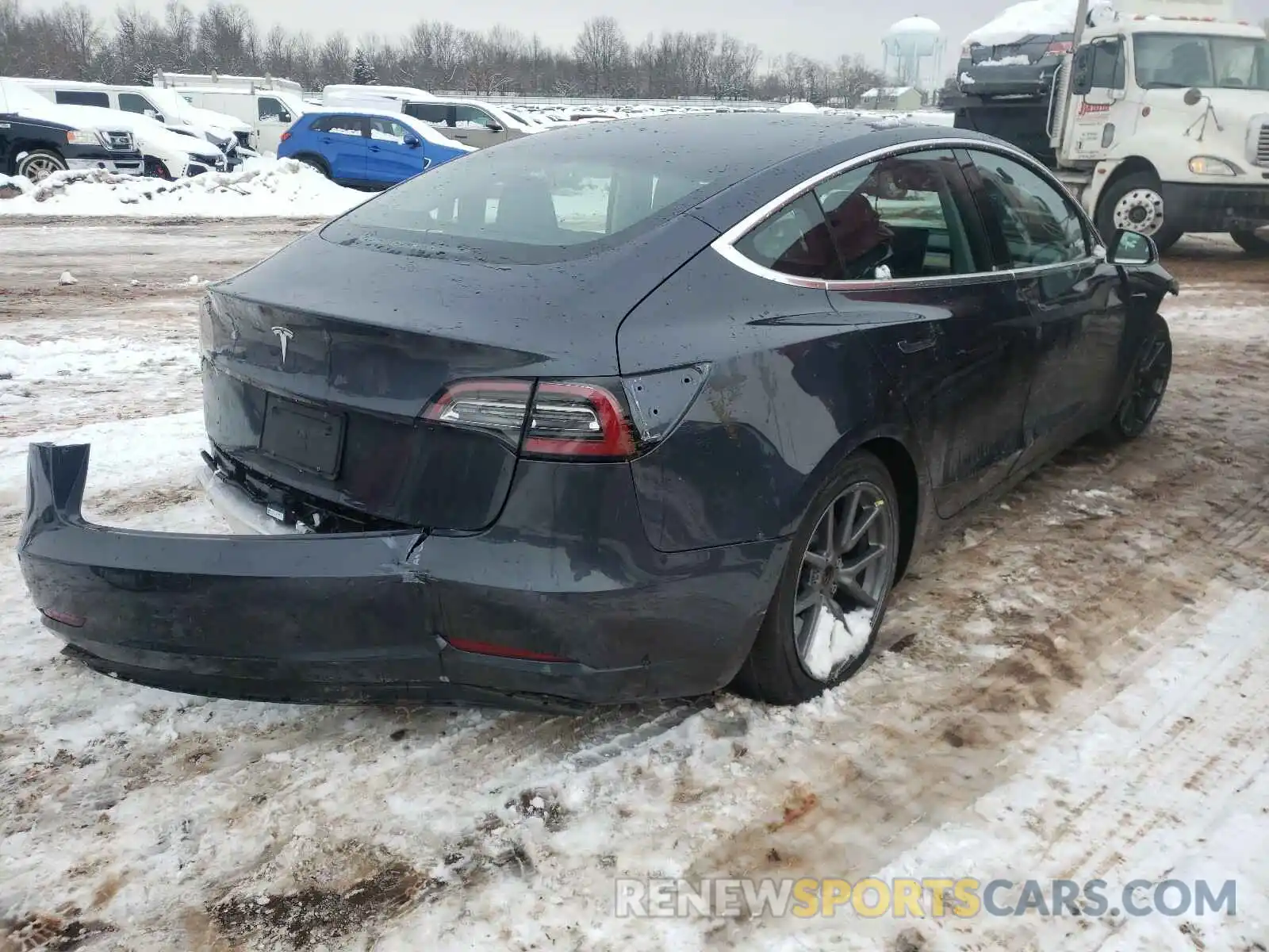 4 Photograph of a damaged car 5YJ3E1EB2LF635287 TESLA MODEL 3 2020