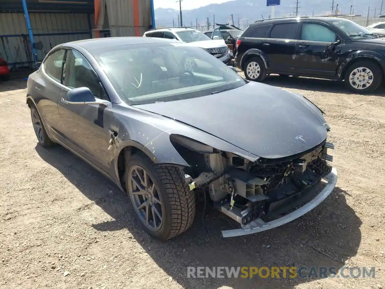 1 Photograph of a damaged car 5YJ3E1EB2LF635449 TESLA MODEL 3 2020