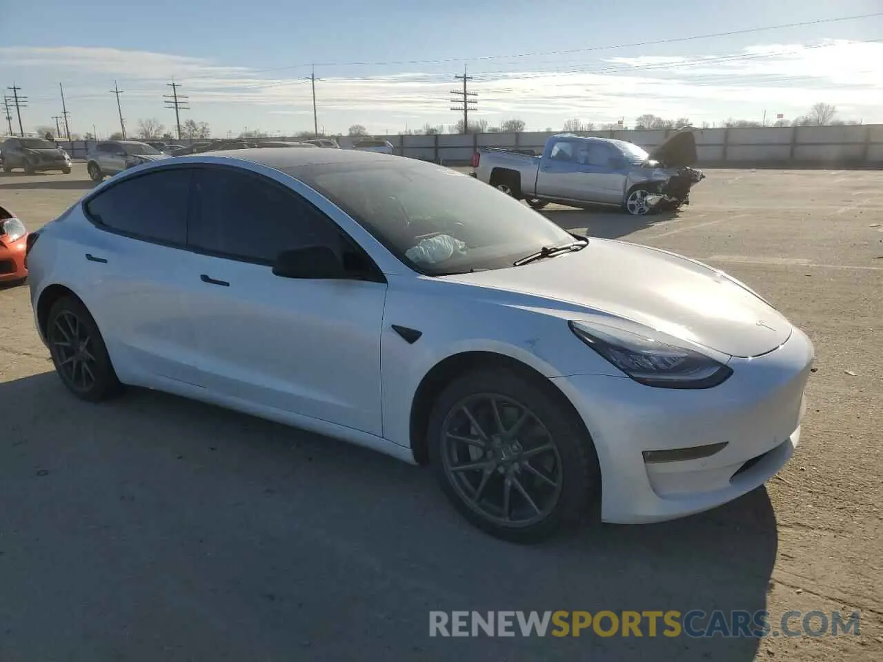 4 Photograph of a damaged car 5YJ3E1EB2LF636567 TESLA MODEL 3 2020