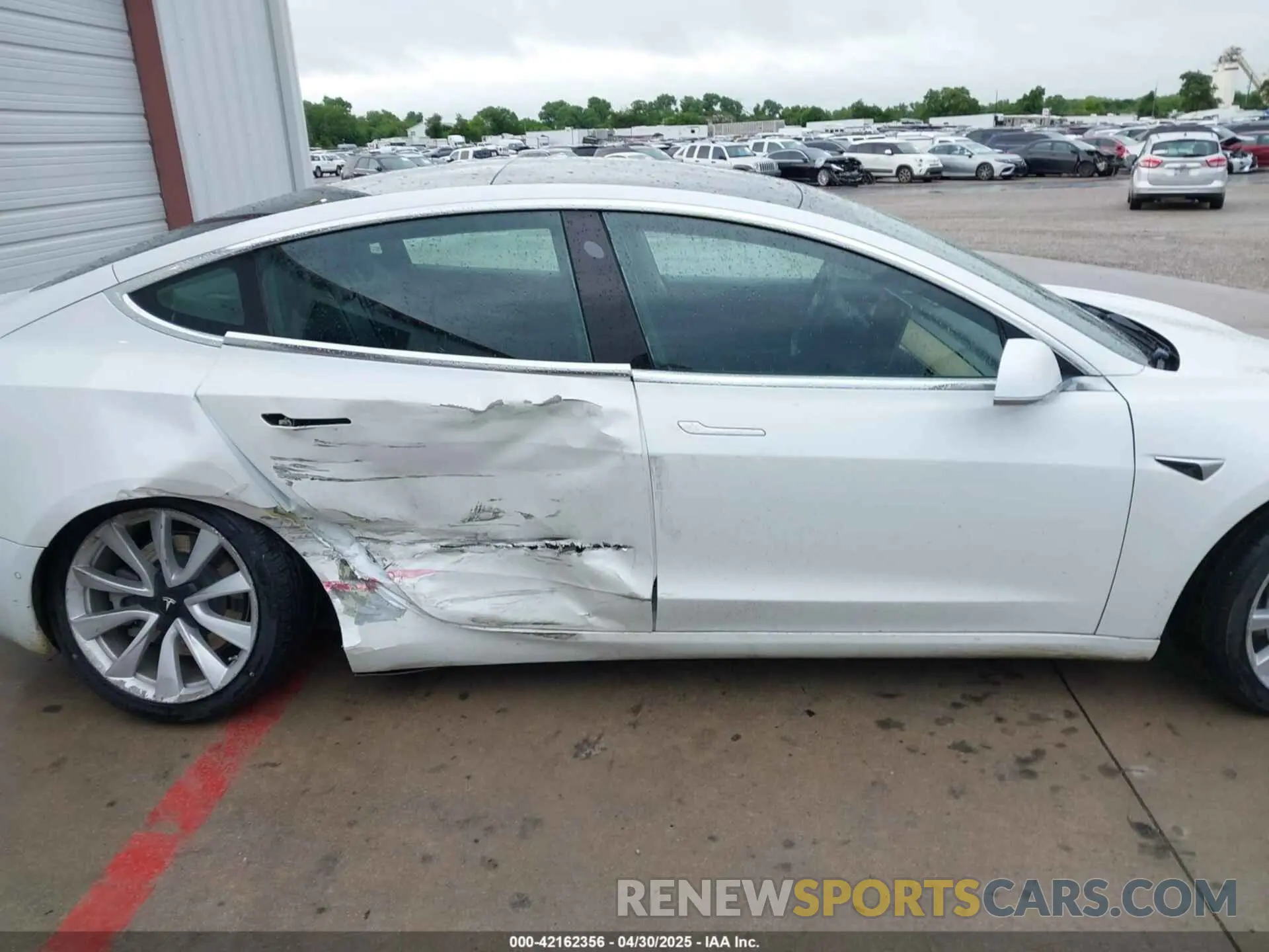 12 Photograph of a damaged car 5YJ3E1EB2LF638612 TESLA MODEL 3 2020