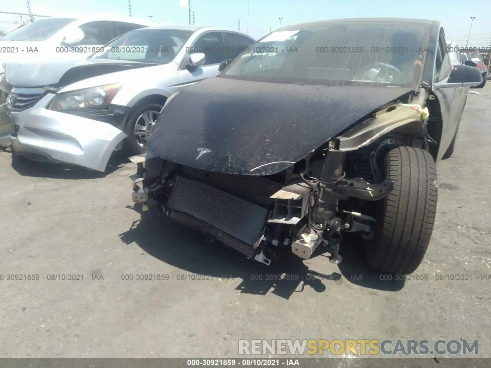 6 Photograph of a damaged car 5YJ3E1EB2LF710473 TESLA MODEL 3 2020