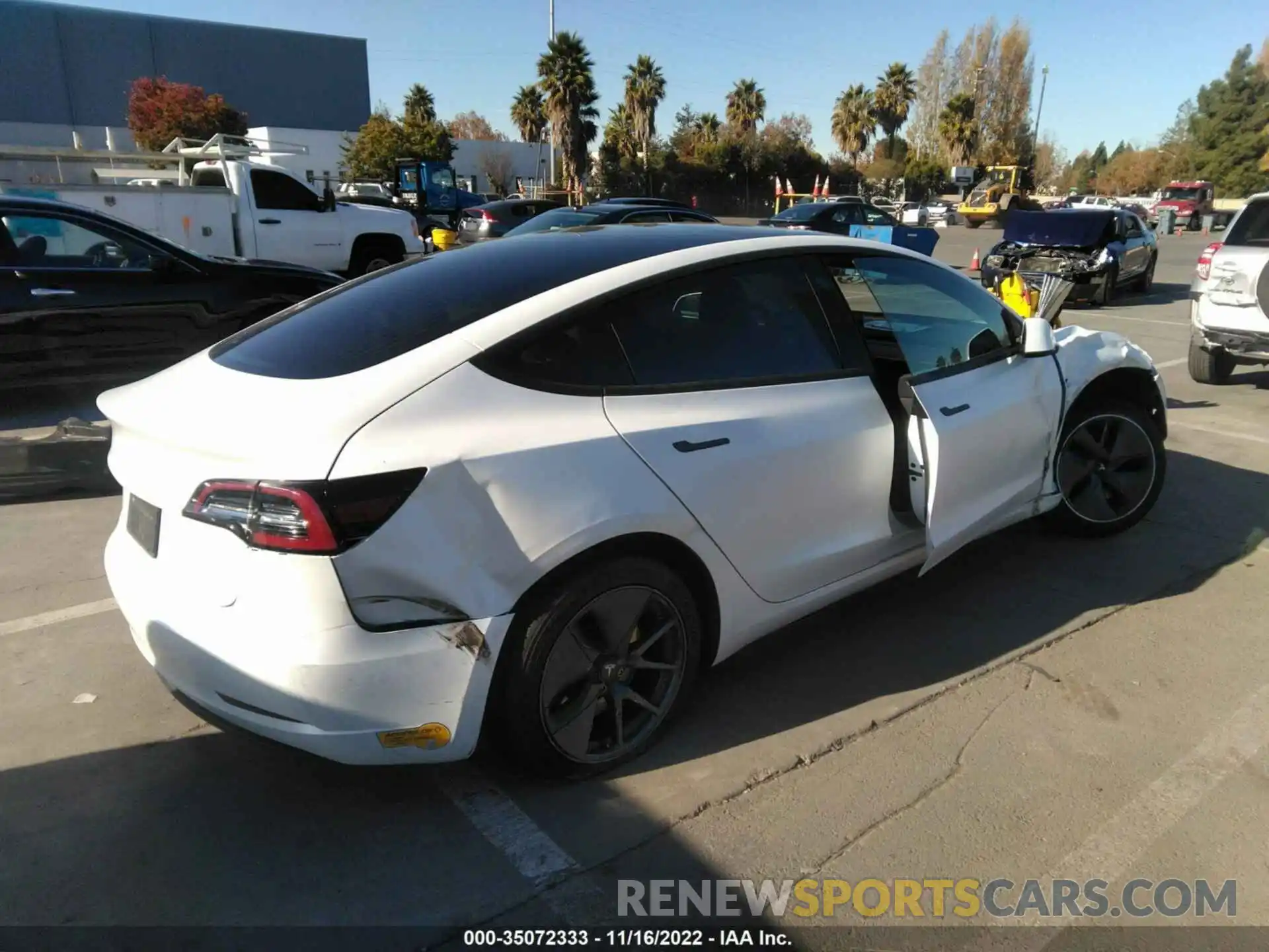 4 Photograph of a damaged car 5YJ3E1EB2LF711719 TESLA MODEL 3 2020