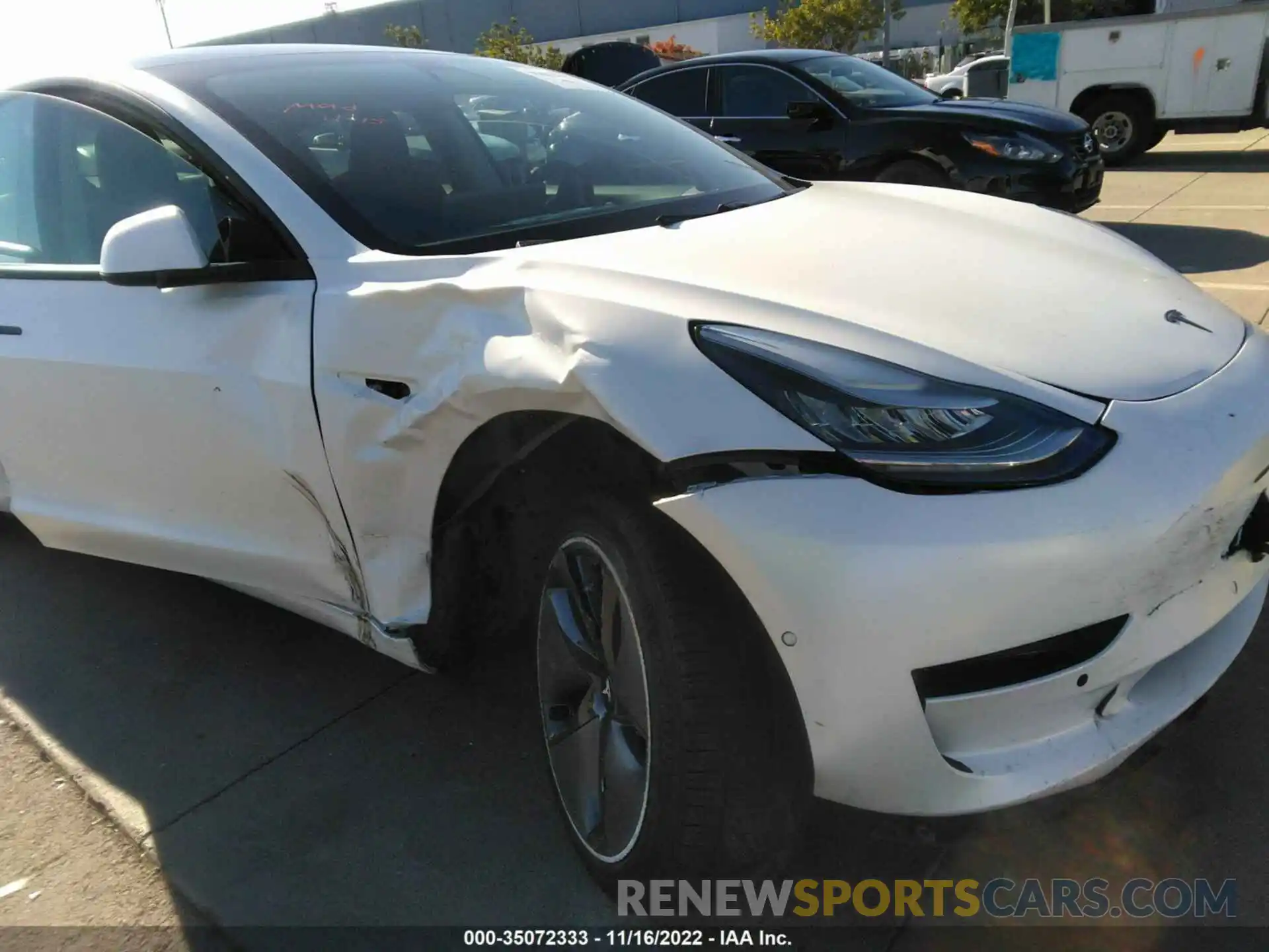 6 Photograph of a damaged car 5YJ3E1EB2LF711719 TESLA MODEL 3 2020