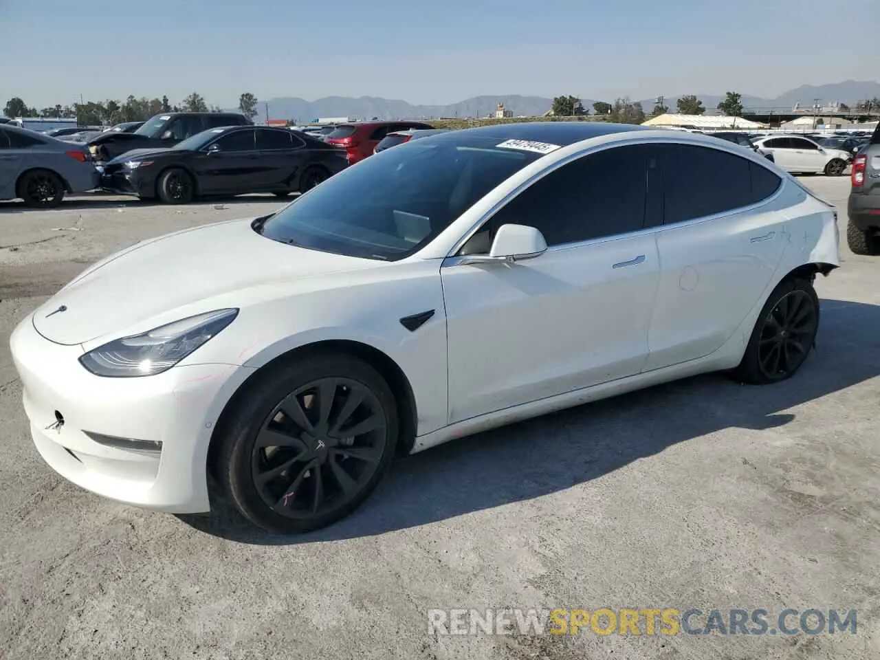 1 Photograph of a damaged car 5YJ3E1EB2LF712322 TESLA MODEL 3 2020