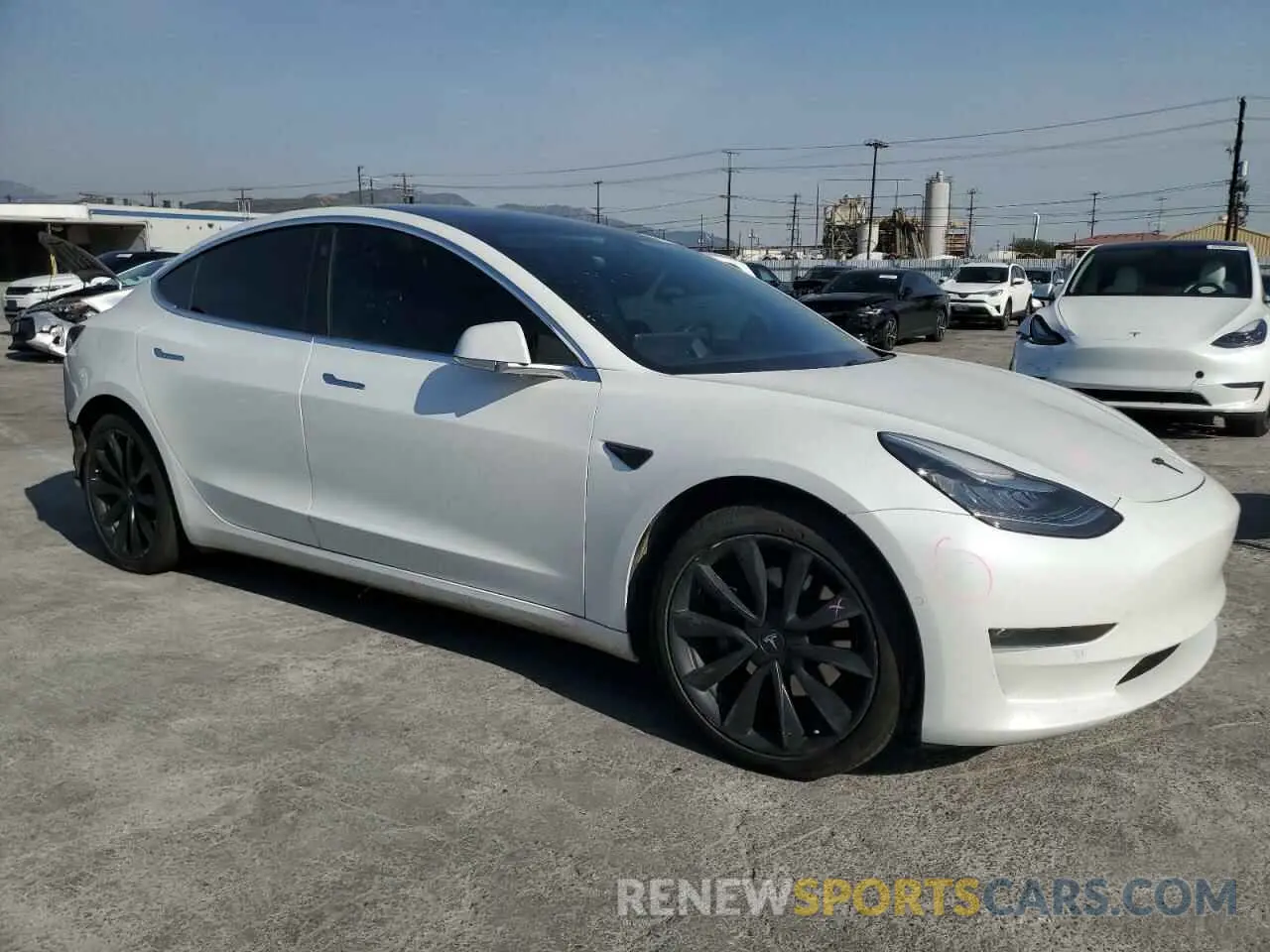 4 Photograph of a damaged car 5YJ3E1EB2LF712322 TESLA MODEL 3 2020