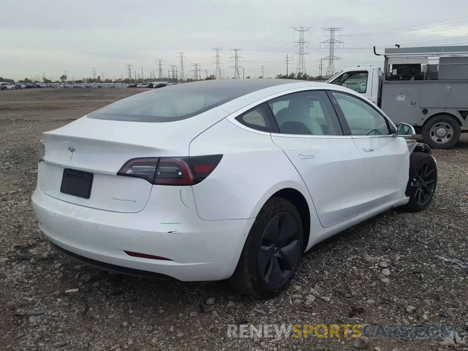 4 Photograph of a damaged car 5YJ3E1EB2LF720209 TESLA MODEL 3 2020