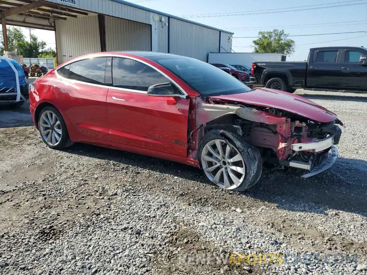 4 Photograph of a damaged car 5YJ3E1EB2LF735969 TESLA MODEL 3 2020