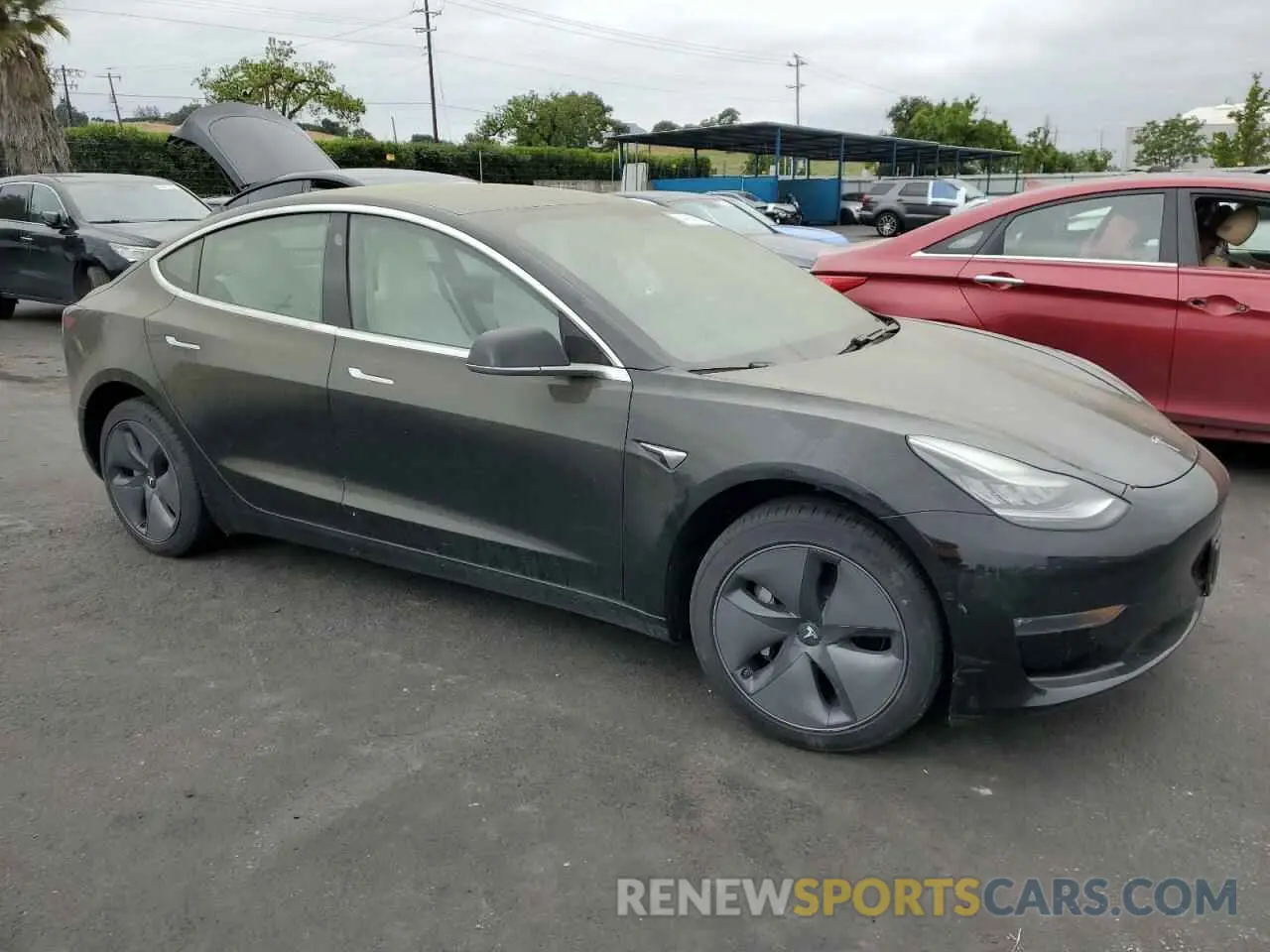 4 Photograph of a damaged car 5YJ3E1EB2LF742131 TESLA MODEL 3 2020