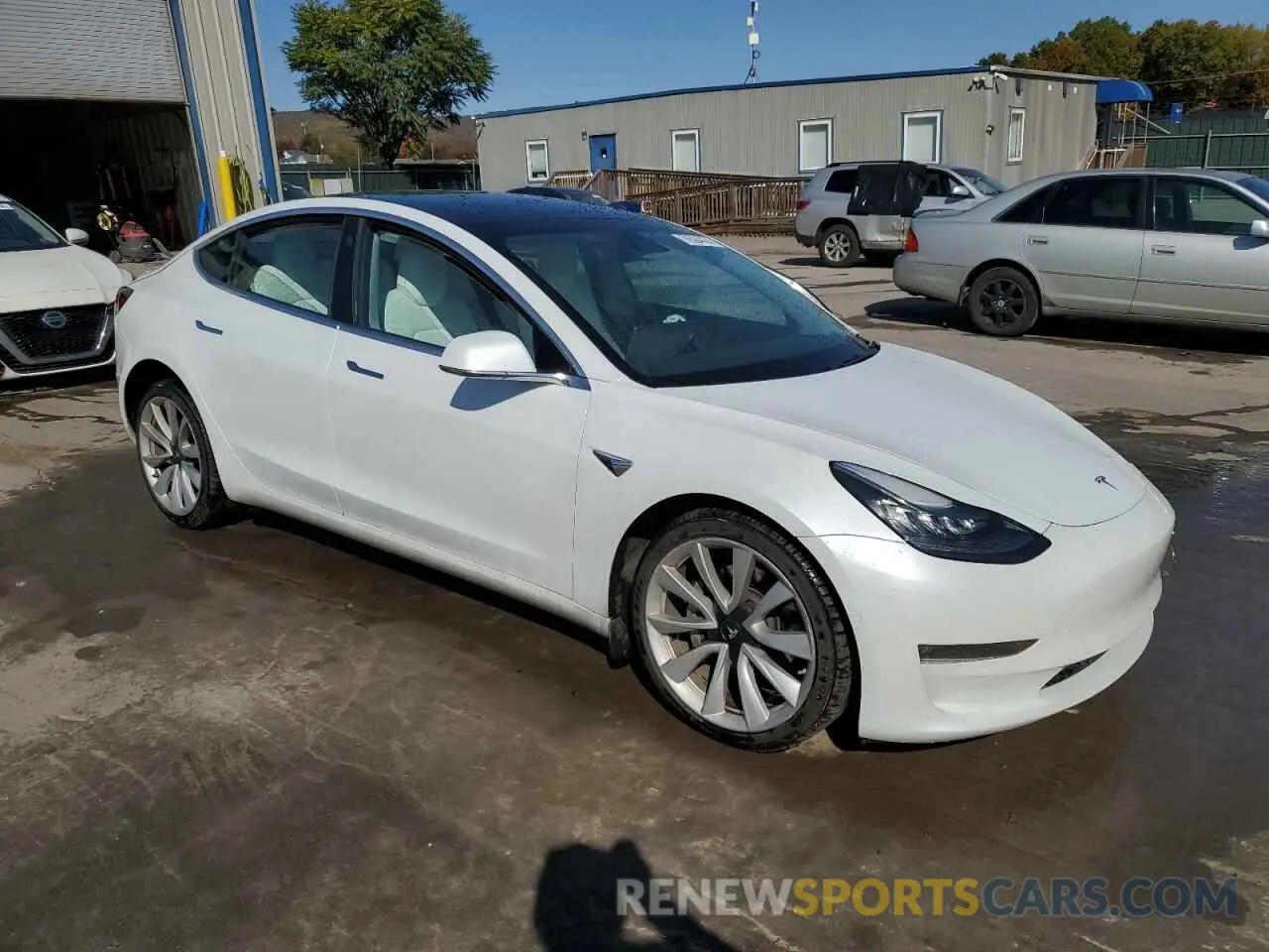 4 Photograph of a damaged car 5YJ3E1EB2LF742307 TESLA MODEL 3 2020