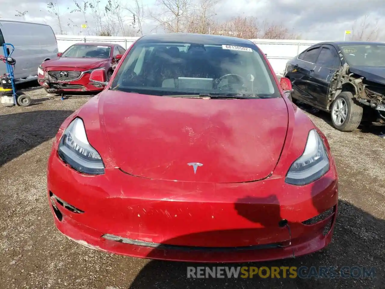 5 Photograph of a damaged car 5YJ3E1EB2LF779938 TESLA MODEL 3 2020