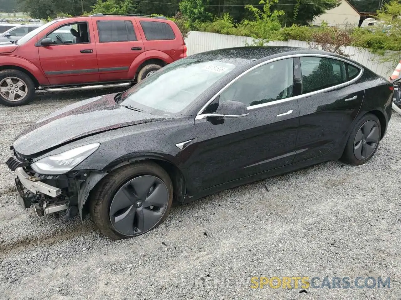 1 Photograph of a damaged car 5YJ3E1EB2LF794696 TESLA MODEL 3 2020