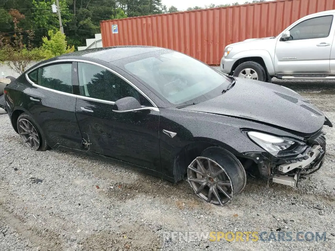 4 Photograph of a damaged car 5YJ3E1EB2LF794696 TESLA MODEL 3 2020