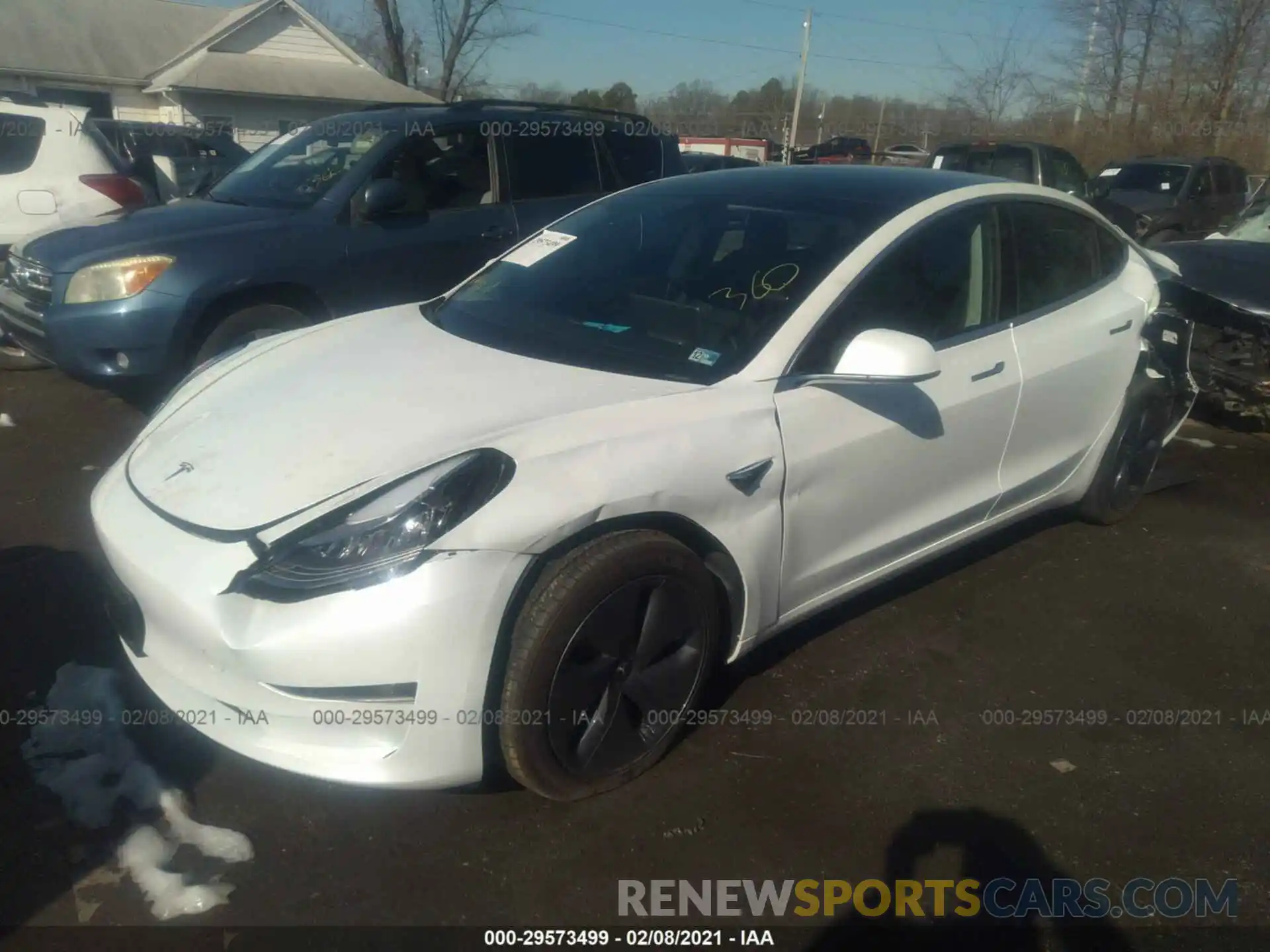 2 Photograph of a damaged car 5YJ3E1EB3LF618580 TESLA MODEL 3 2020