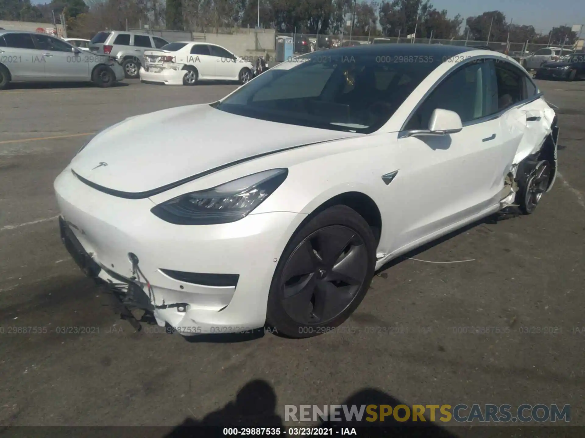 2 Photograph of a damaged car 5YJ3E1EB3LF619664 TESLA MODEL 3 2020