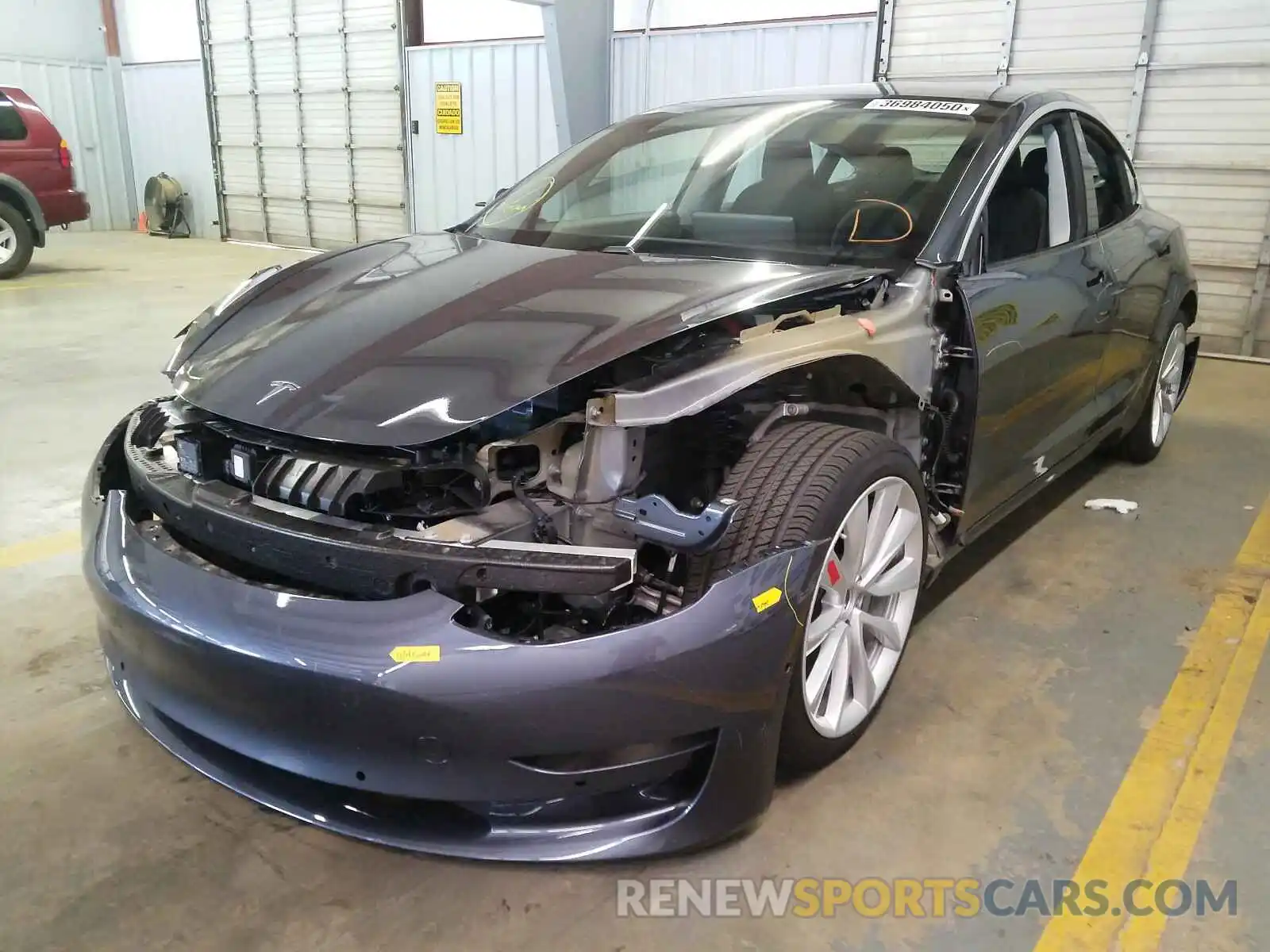 2 Photograph of a damaged car 5YJ3E1EB3LF620166 TESLA MODEL 3 2020