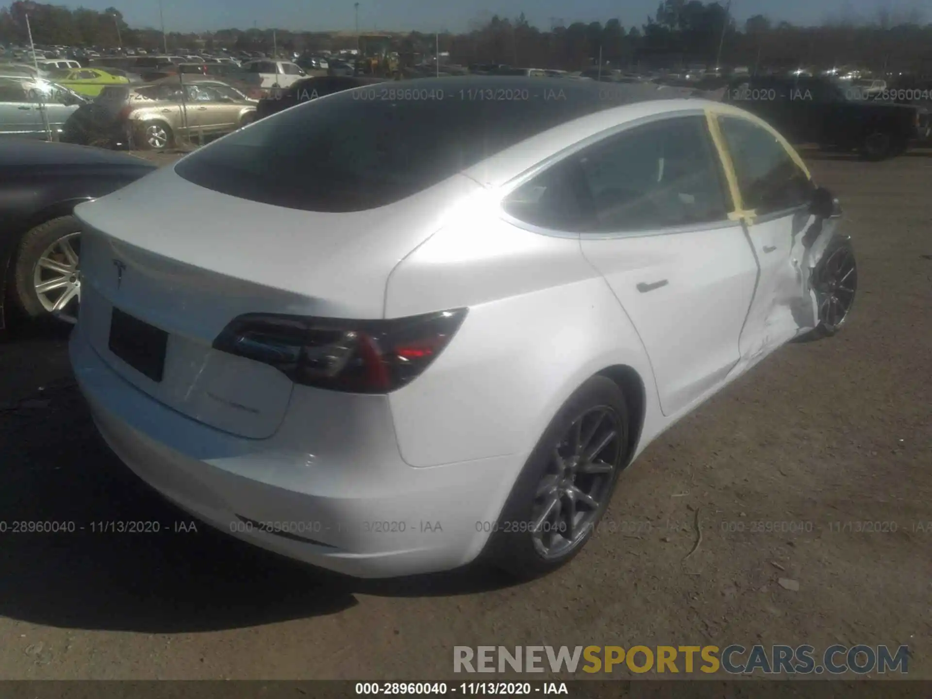 4 Photograph of a damaged car 5YJ3E1EB3LF628669 TESLA MODEL 3 2020