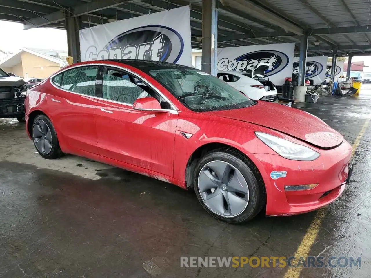 4 Photograph of a damaged car 5YJ3E1EB3LF646301 TESLA MODEL 3 2020