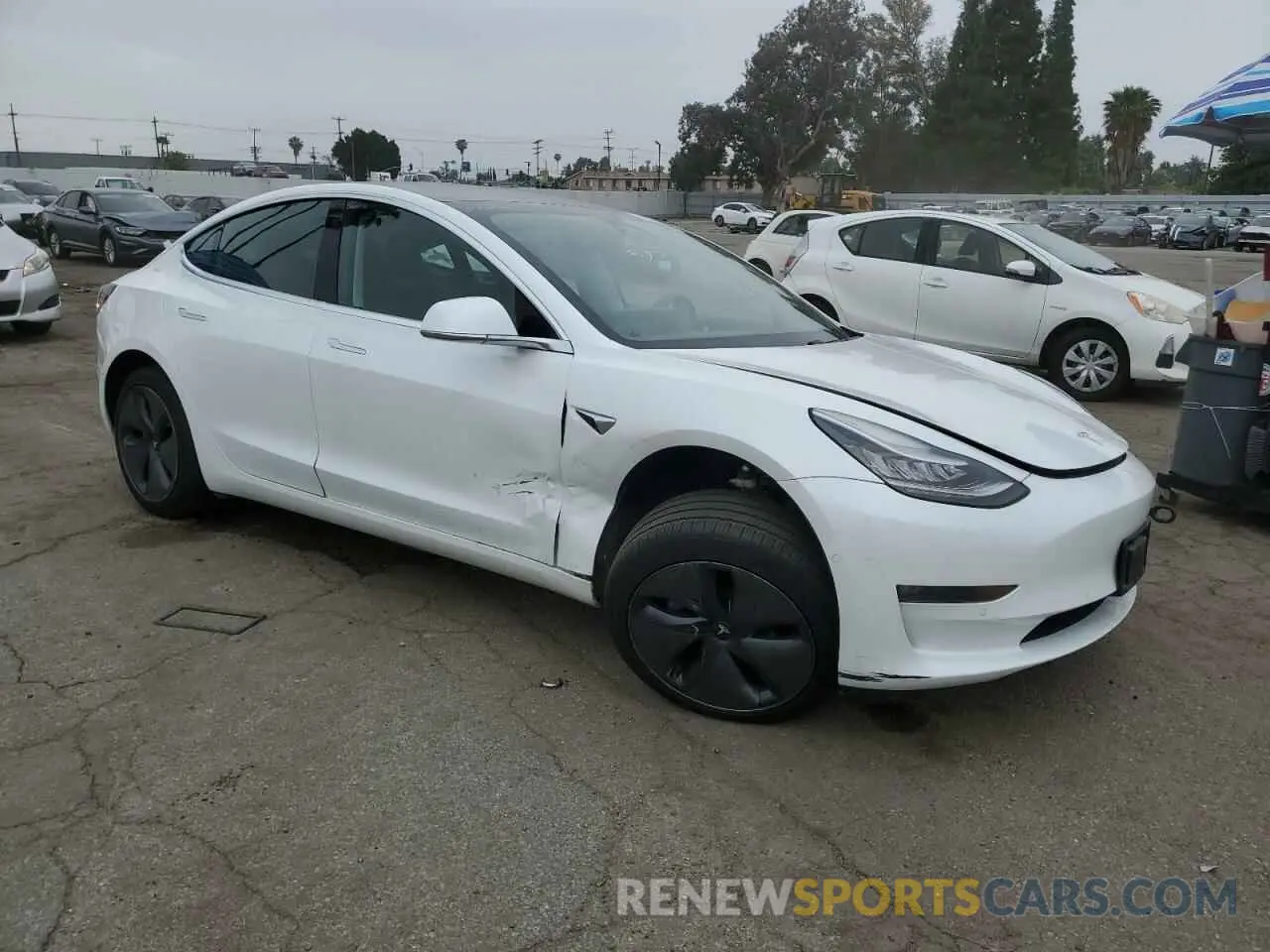 4 Photograph of a damaged car 5YJ3E1EB3LF650252 TESLA MODEL 3 2020