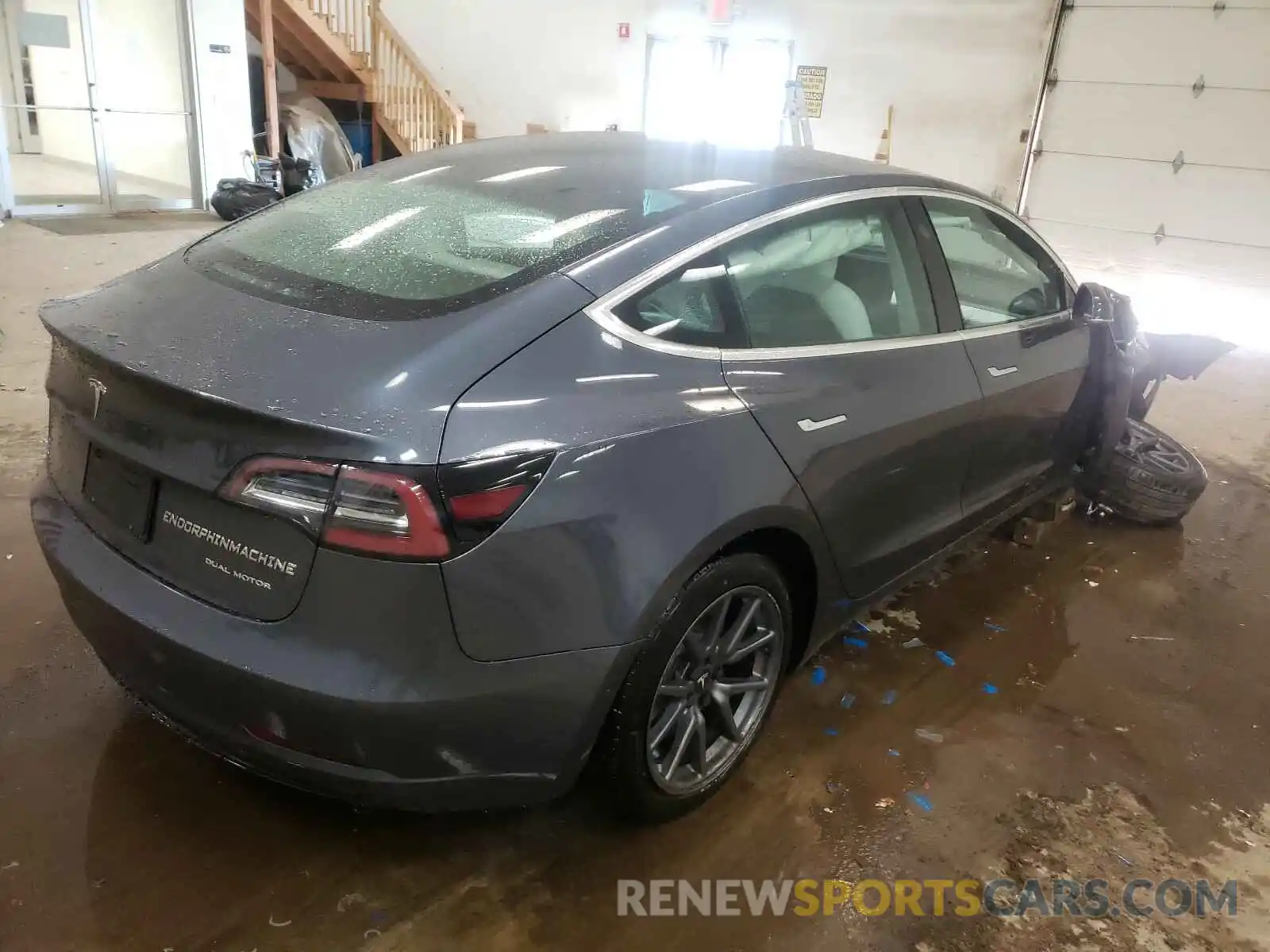 4 Photograph of a damaged car 5YJ3E1EB3LF667973 TESLA MODEL 3 2020