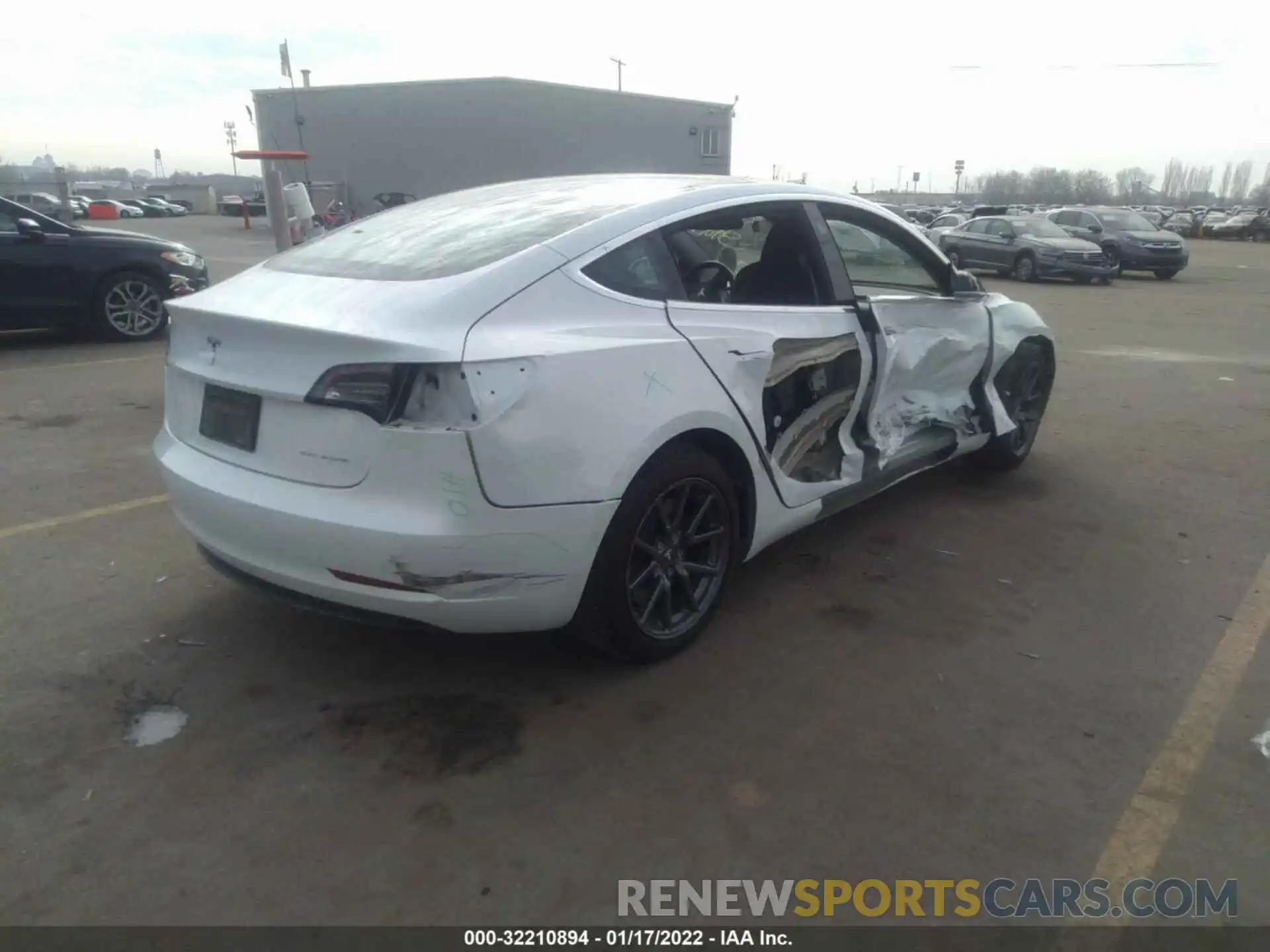 4 Photograph of a damaged car 5YJ3E1EB3LF741599 TESLA MODEL 3 2020