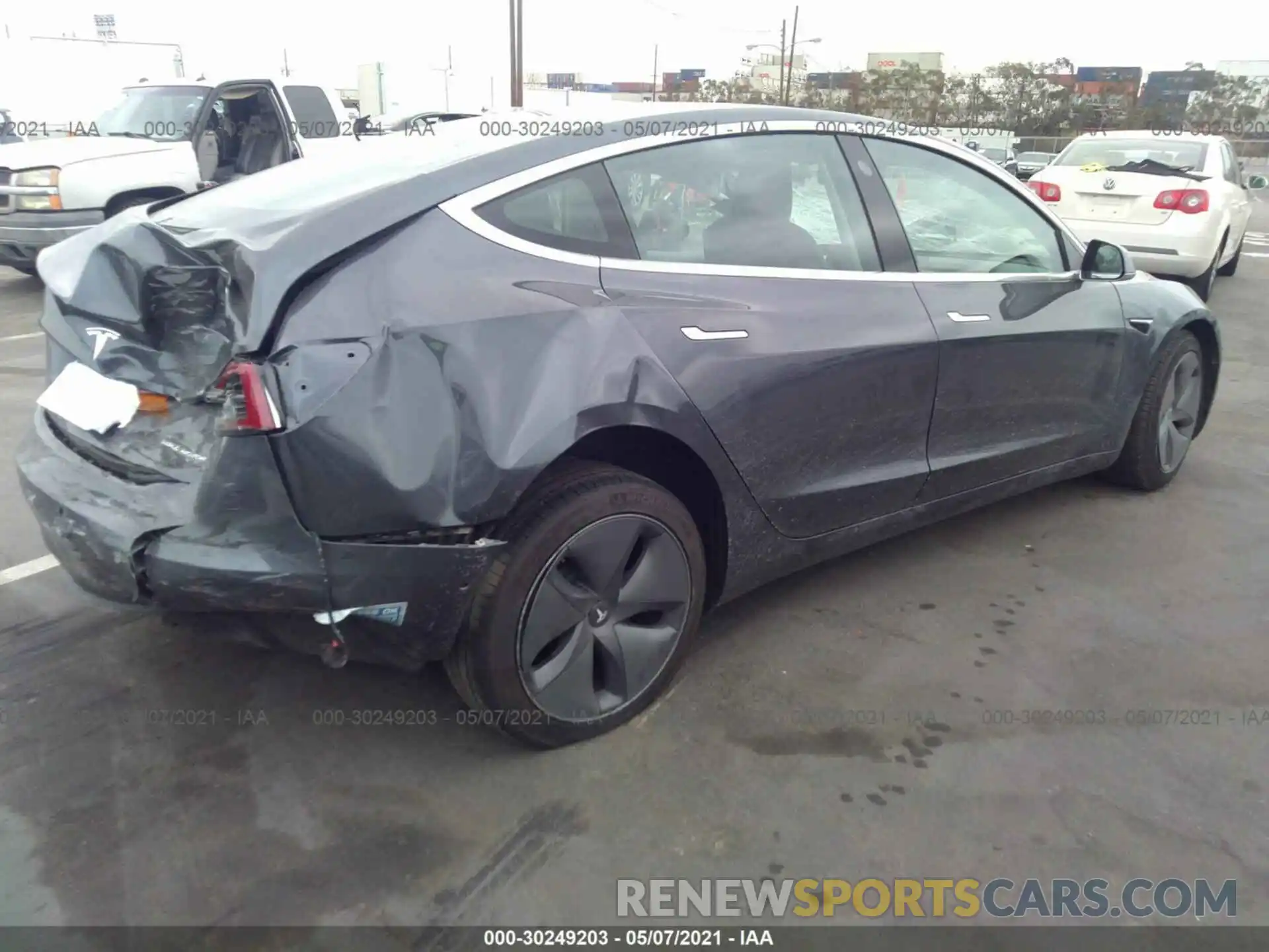 4 Photograph of a damaged car 5YJ3E1EB3LF790396 TESLA MODEL 3 2020