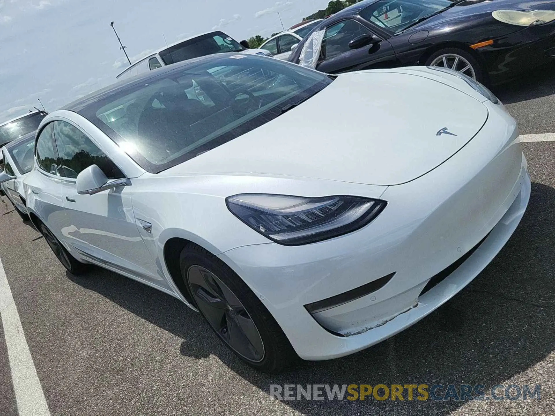 24 Photograph of a damaged car 5YJ3E1EB3LF795047 TESLA MODEL 3 2020