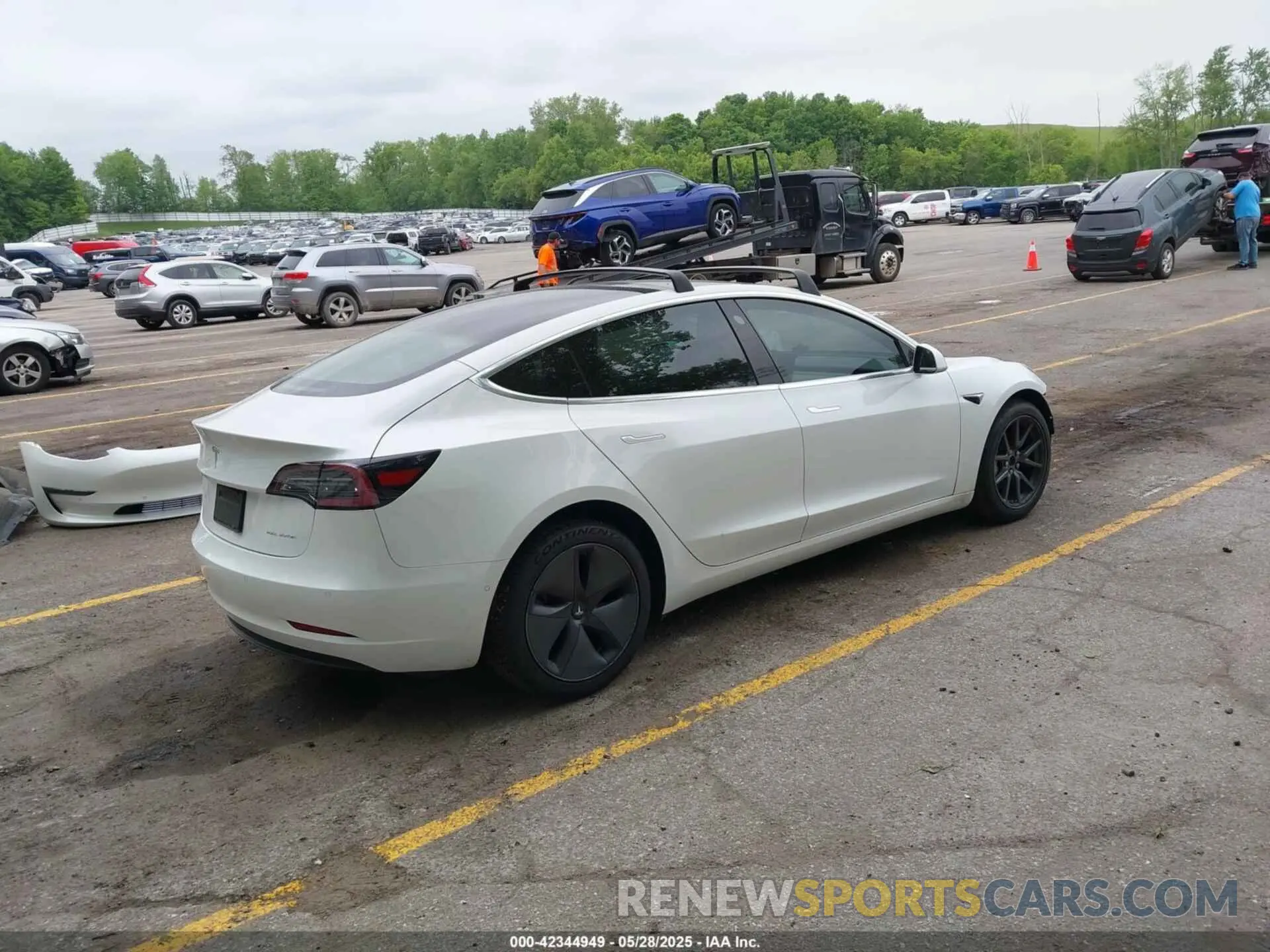 4 Photograph of a damaged car 5YJ3E1EB3LF801056 TESLA MODEL 3 2020