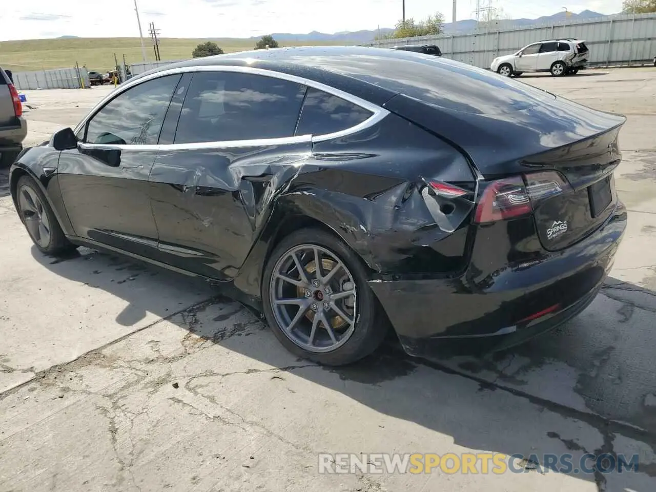 2 Photograph of a damaged car 5YJ3E1EB4LF599909 TESLA MODEL 3 2020